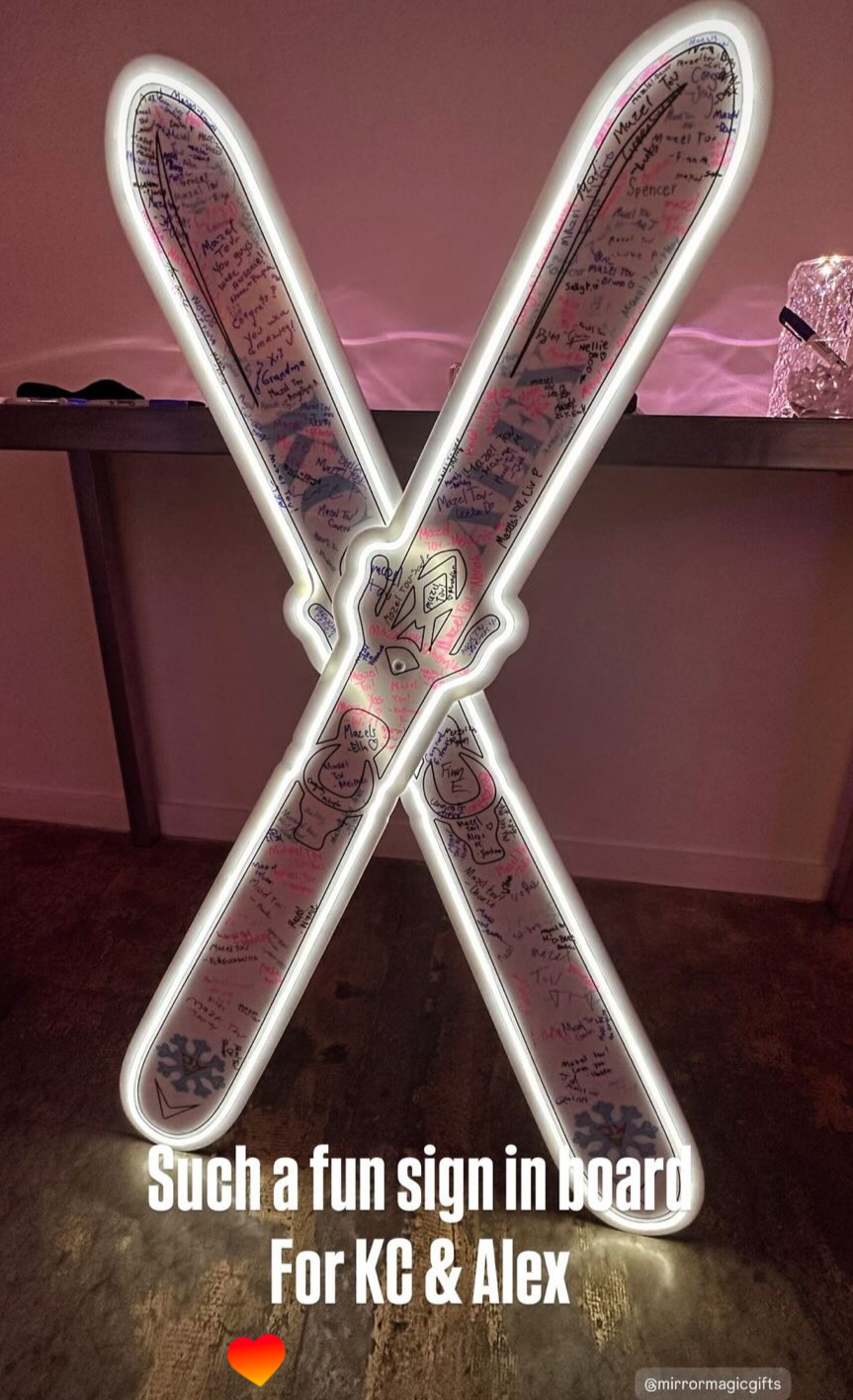 Neon ski sign-in board. 