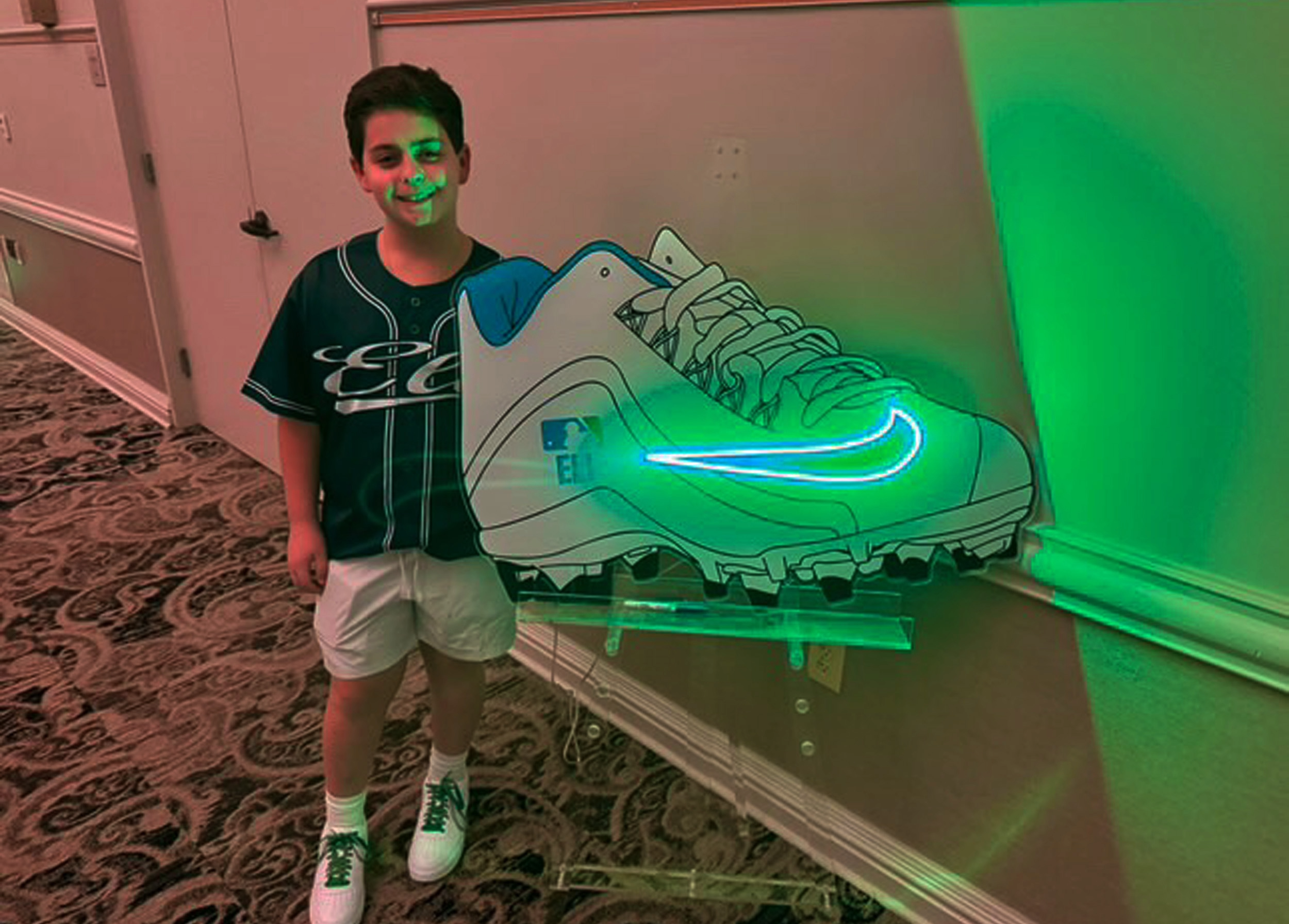 Custom Nike sneaker sign in board with green neon detailing.  