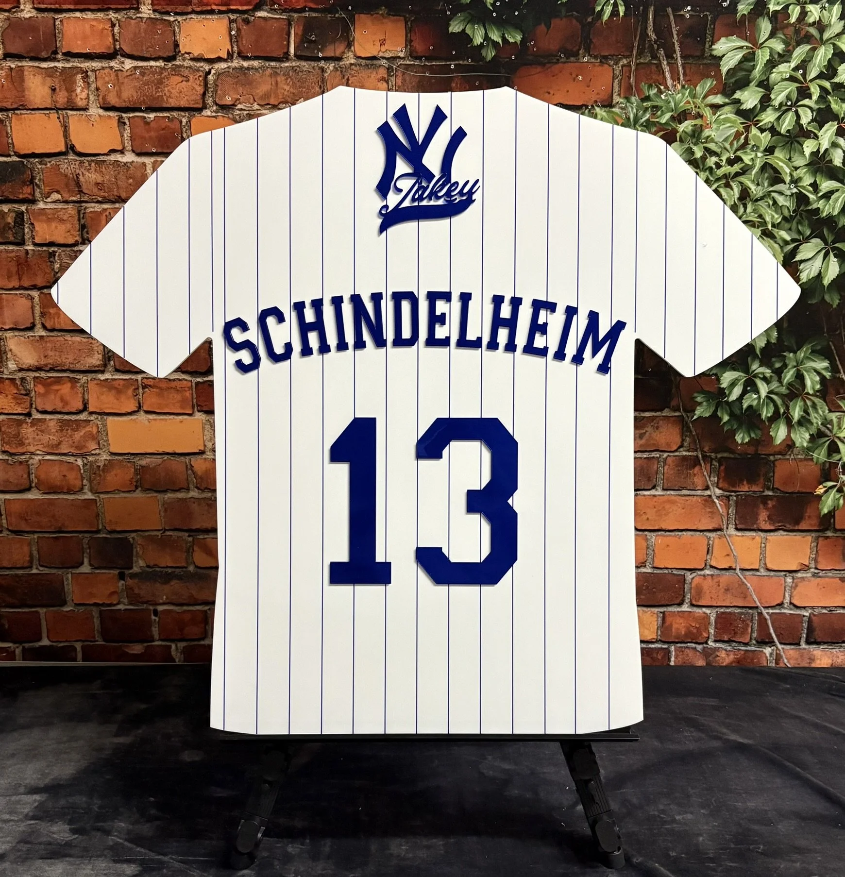 Classic Yankees pinstripe baseball jersey inspired by one of the game's most iconic looks.