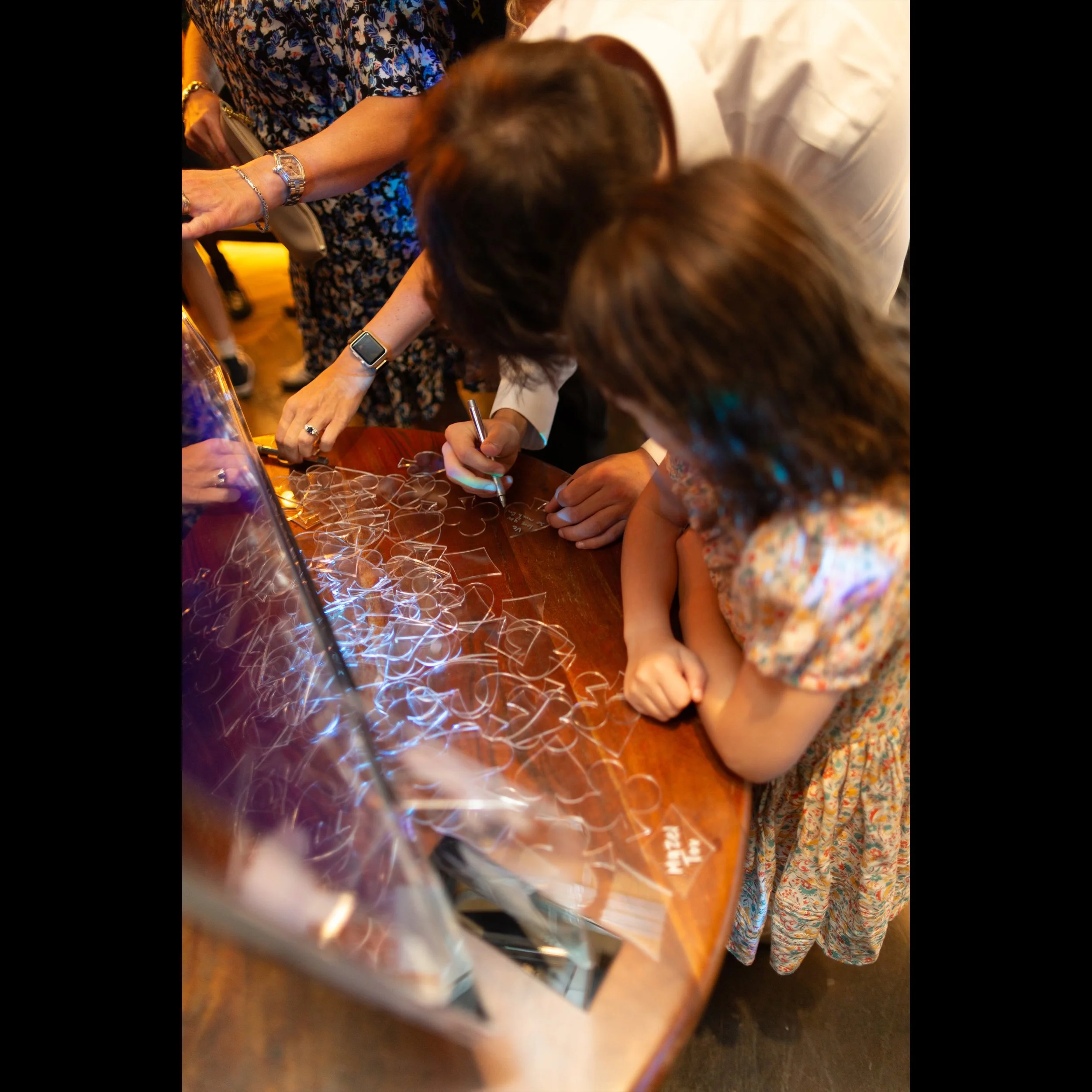 Eva Gambling Drop Box People Signing.jpg