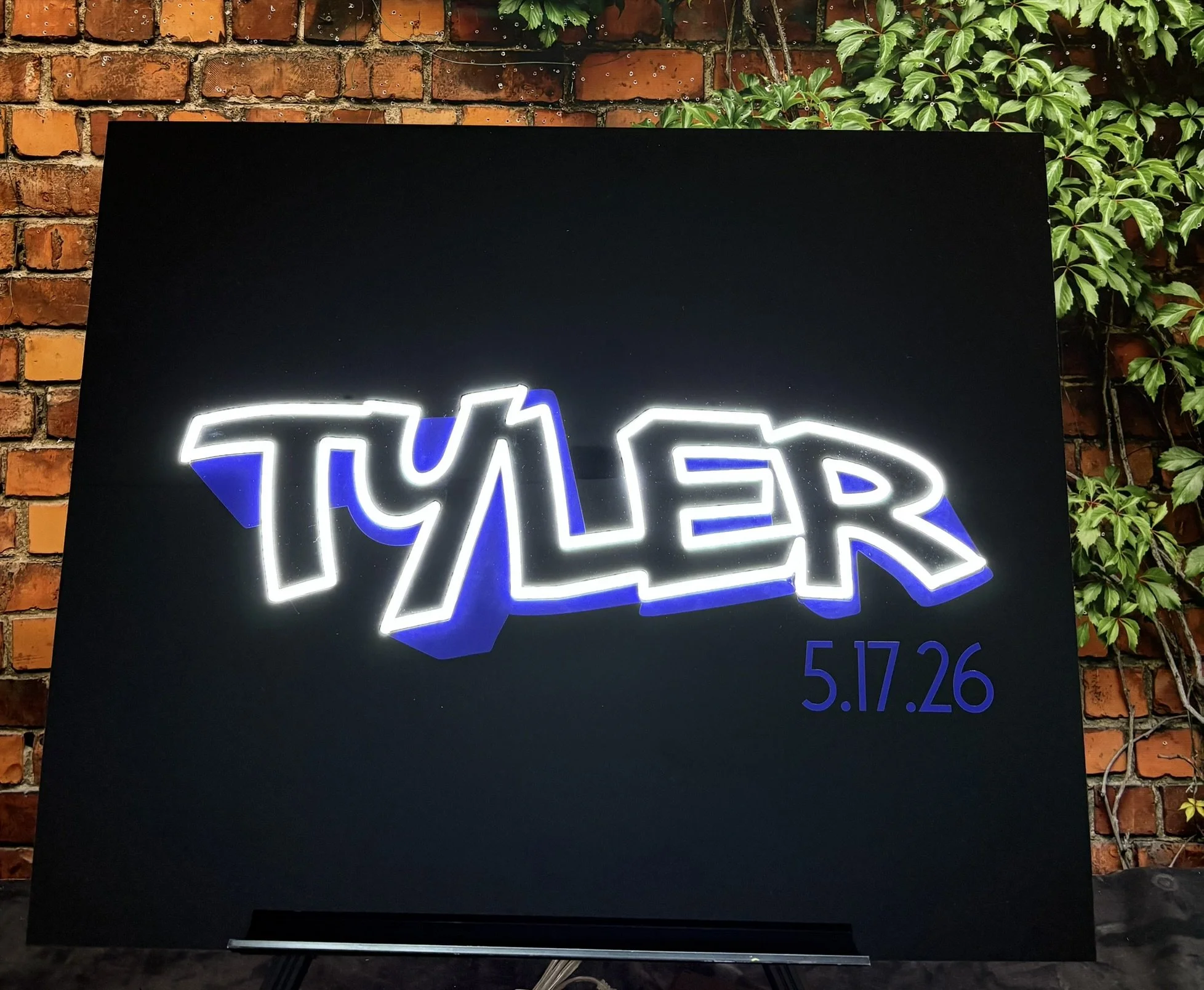 Neon sign in board_Custom Name_Graffiti_Bar_White and blue.JPEG