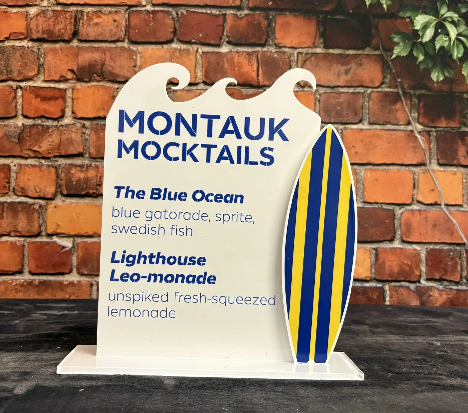 Custom summer themed drink menu with a surfboard. 