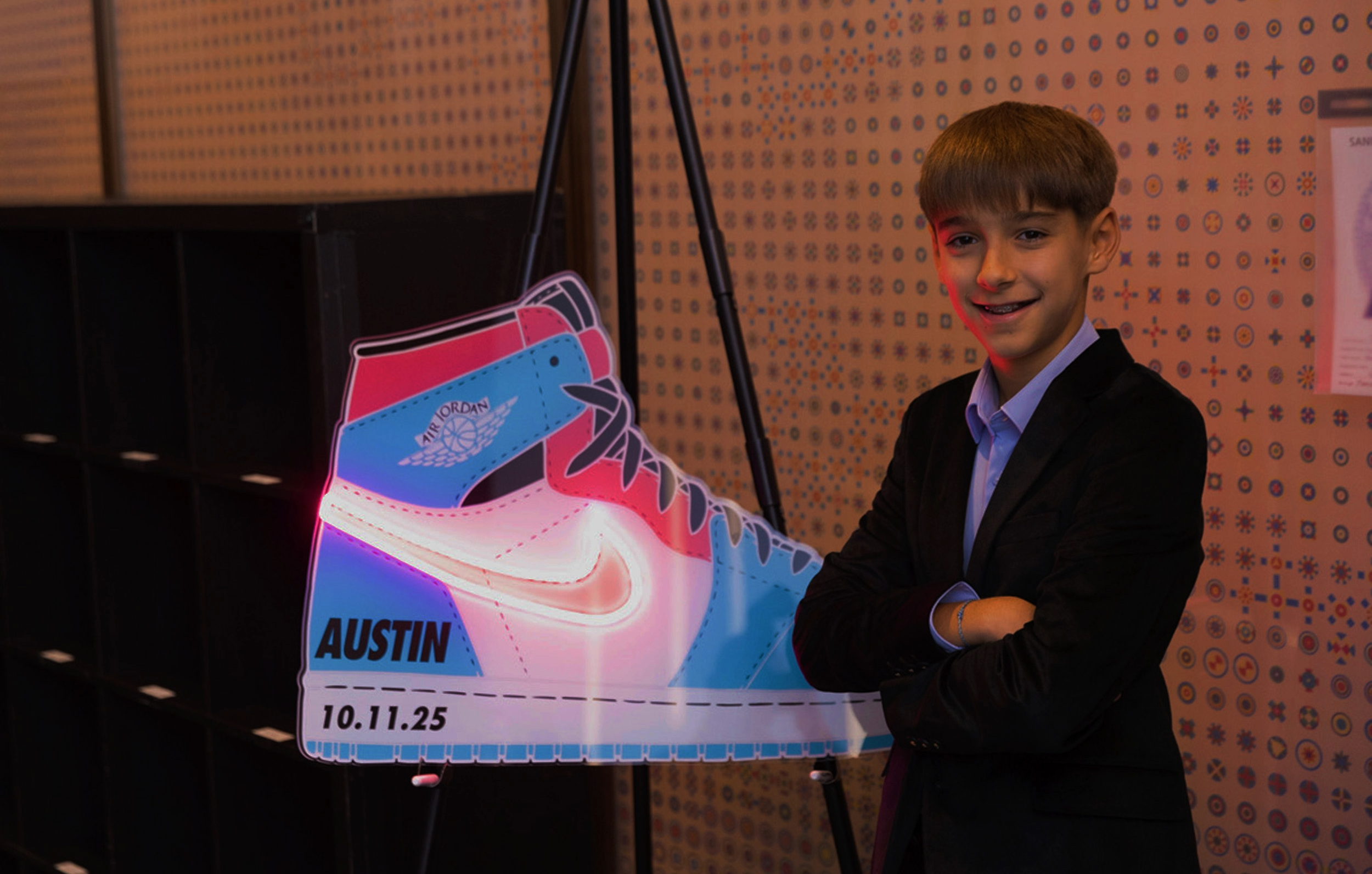 Custom blue and pink Nike sneaker sign-in board with neon detailing. 