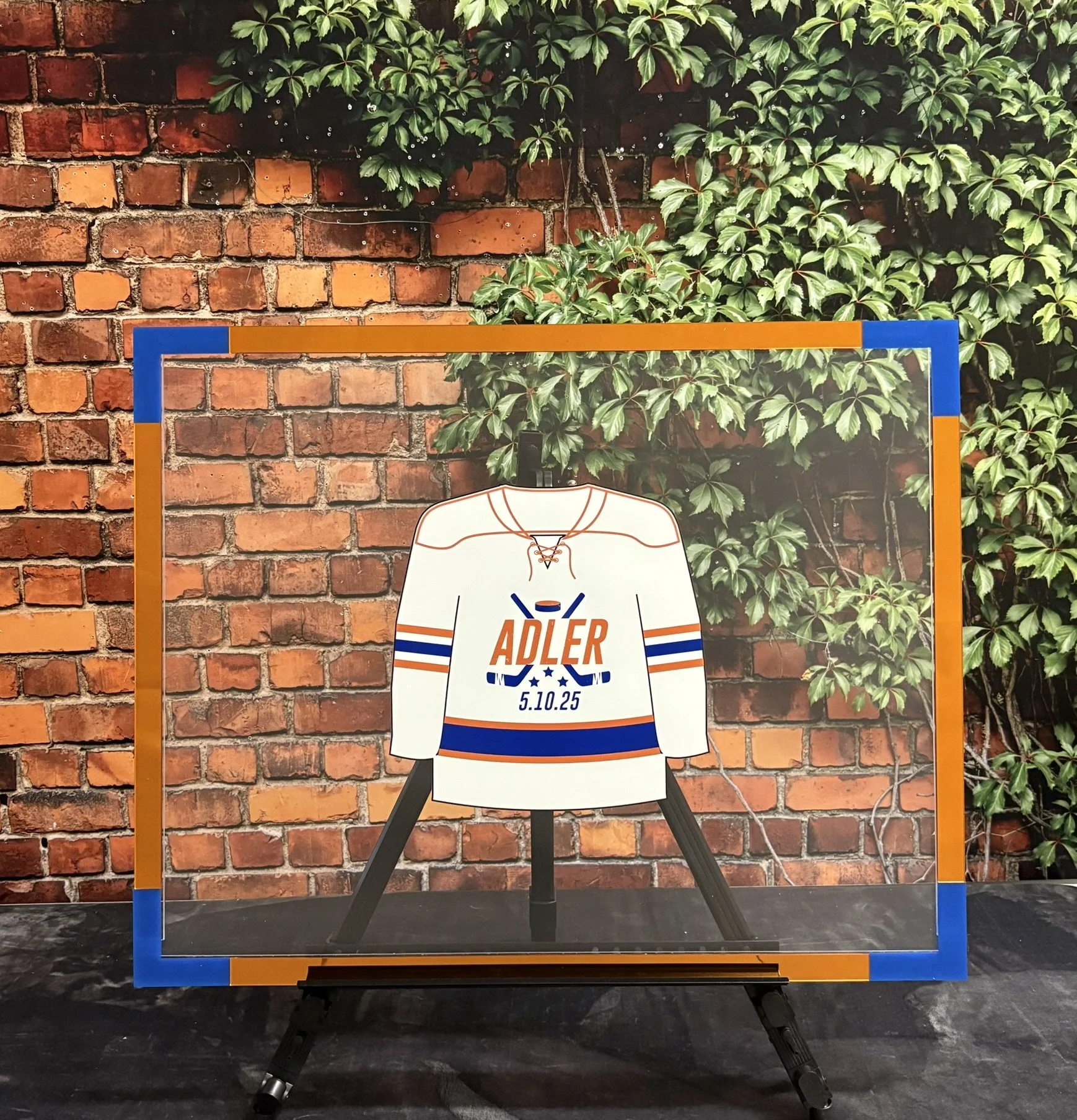 Hockey Jersey Drop Box_Puck_Blue and Orange 2_Bar.JPEG