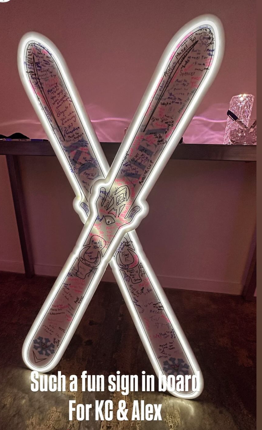 Custom ski sign-in board with neon detailing. 