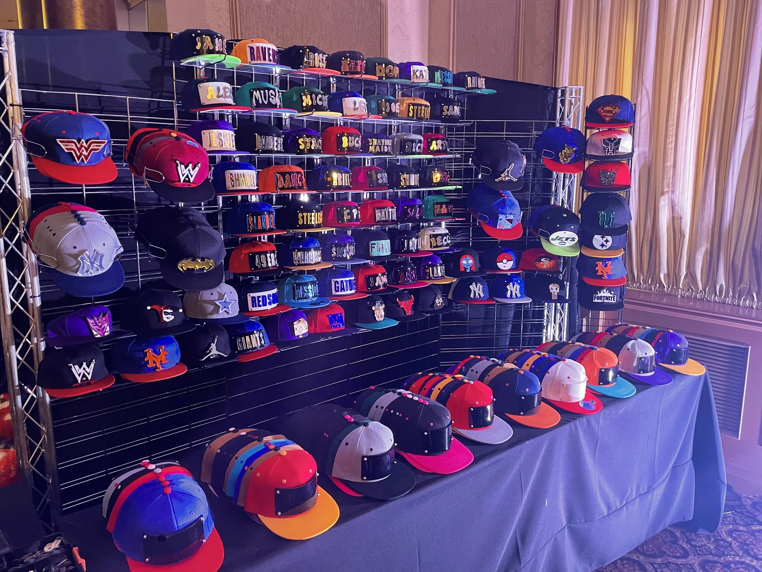 customized mirrored hat station done on site at party