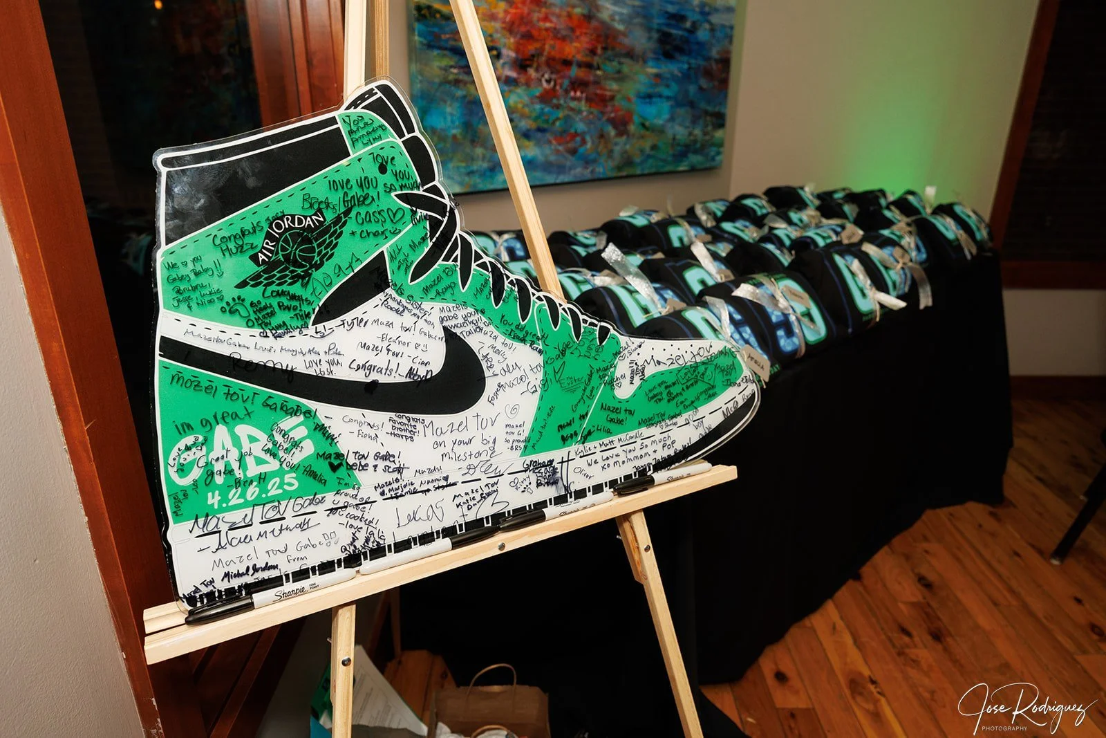 Custom green, white, and black Nike Air Jordan sneaker sign-in board. 