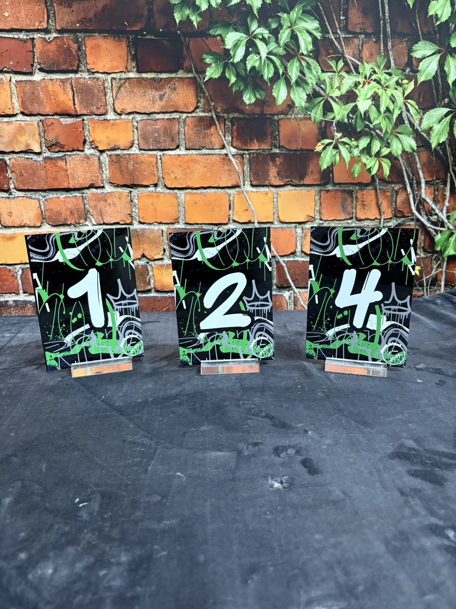 Spray Paint Graffiti Table NUmbers_Green, black, and white_Bar.JPEG