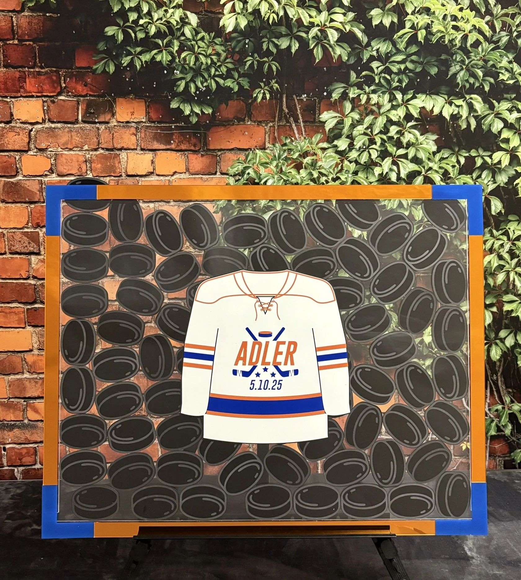 Hockey Jersey Drop Box_Puck_Blue and Orange_Bar.JPEG