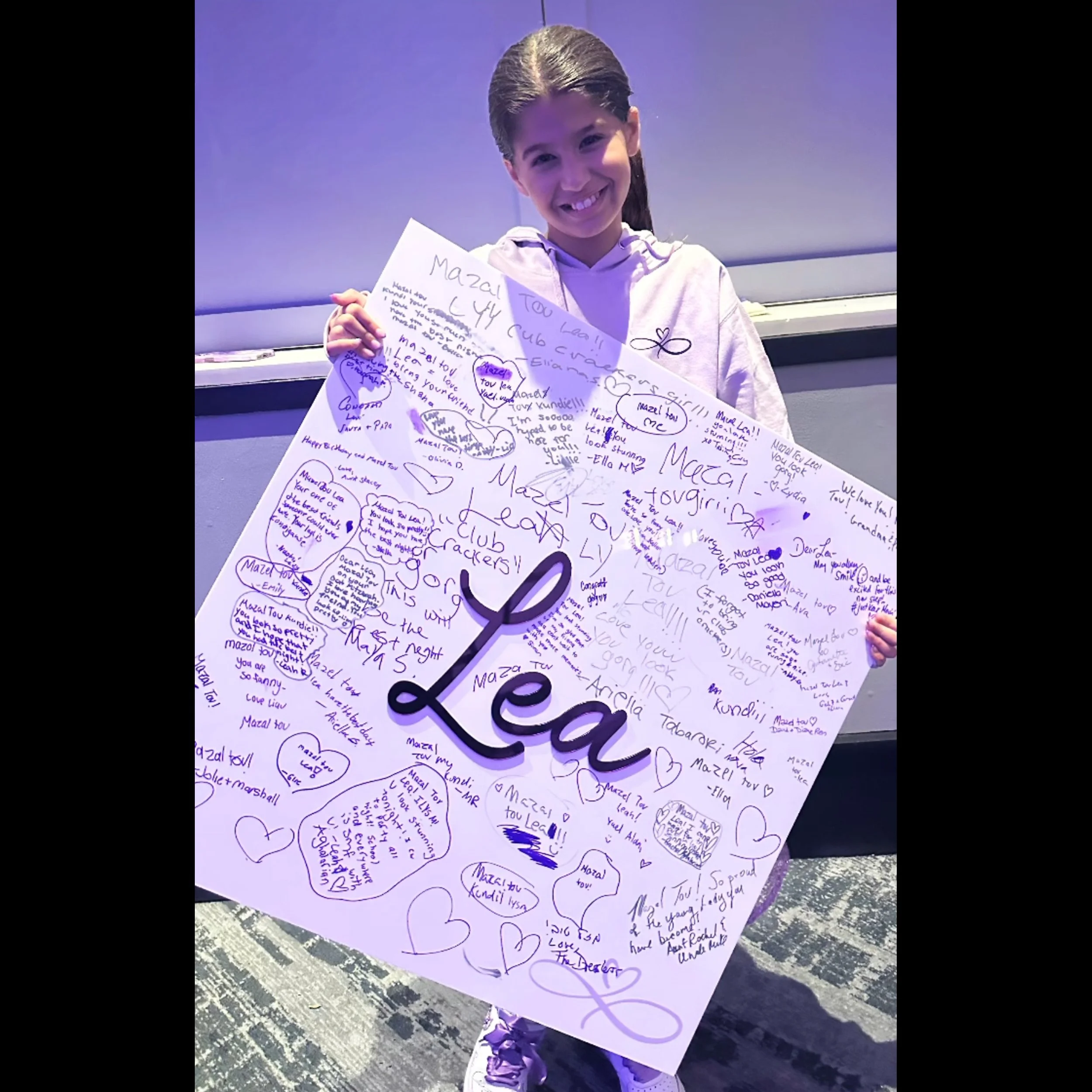 Lea with her White Board SIgned.jpg