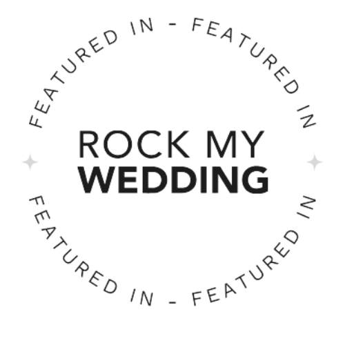 Circular badge with the text 'Featured in - Rock My Wedding' repeated along the border.