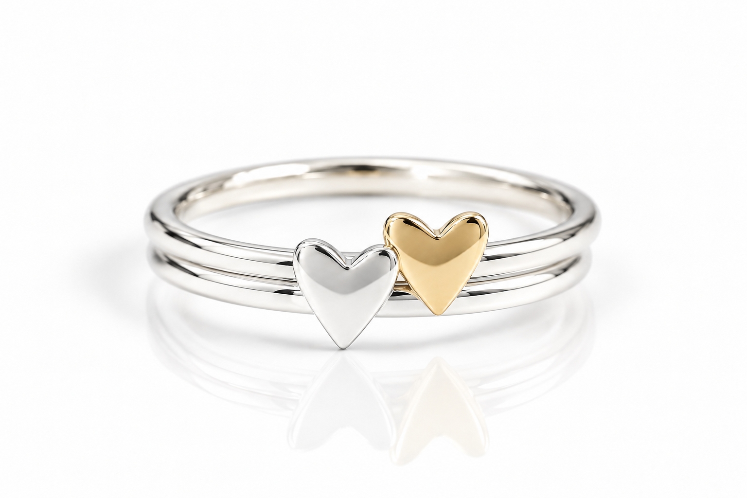Stacked Gold and Silver Heart Rings(1).png