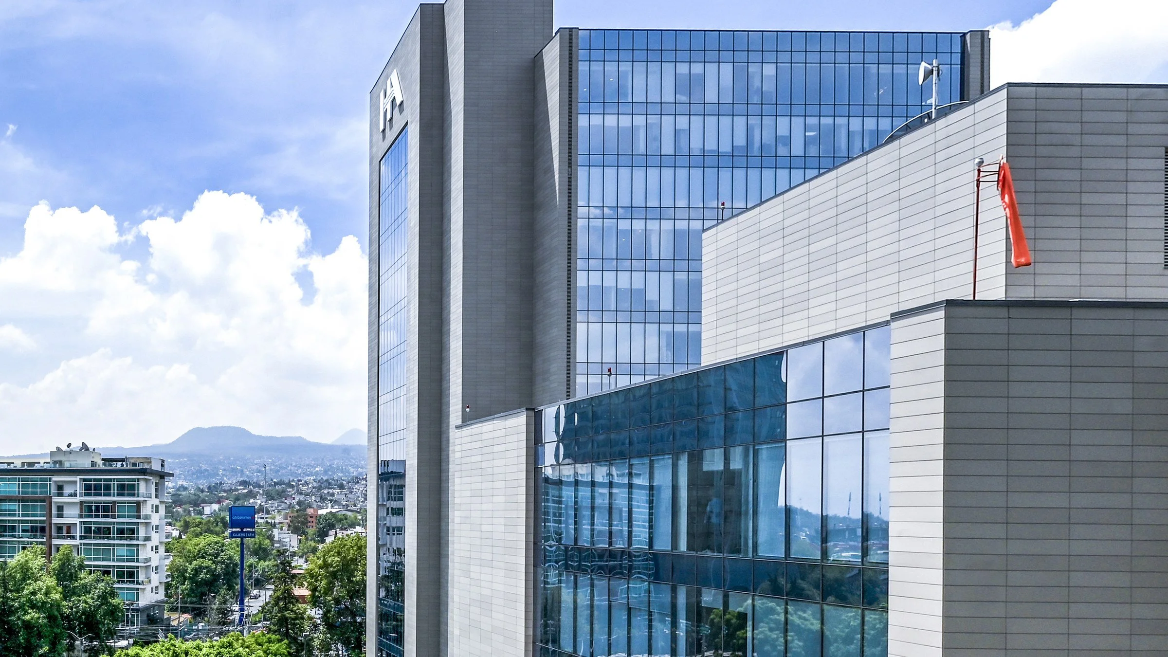 Glass and stone facade of Hospital Ángeles Pedregal, a private hospital in Mexico City