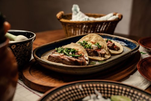 Tacos served on a table at a Mexico City taqueria