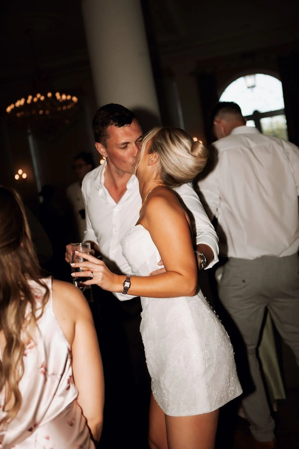bride and groom wedding couple kissing on dancefloor