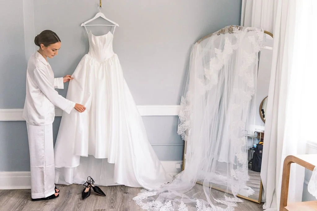 Wedding dress hanging up in Tower Suite.