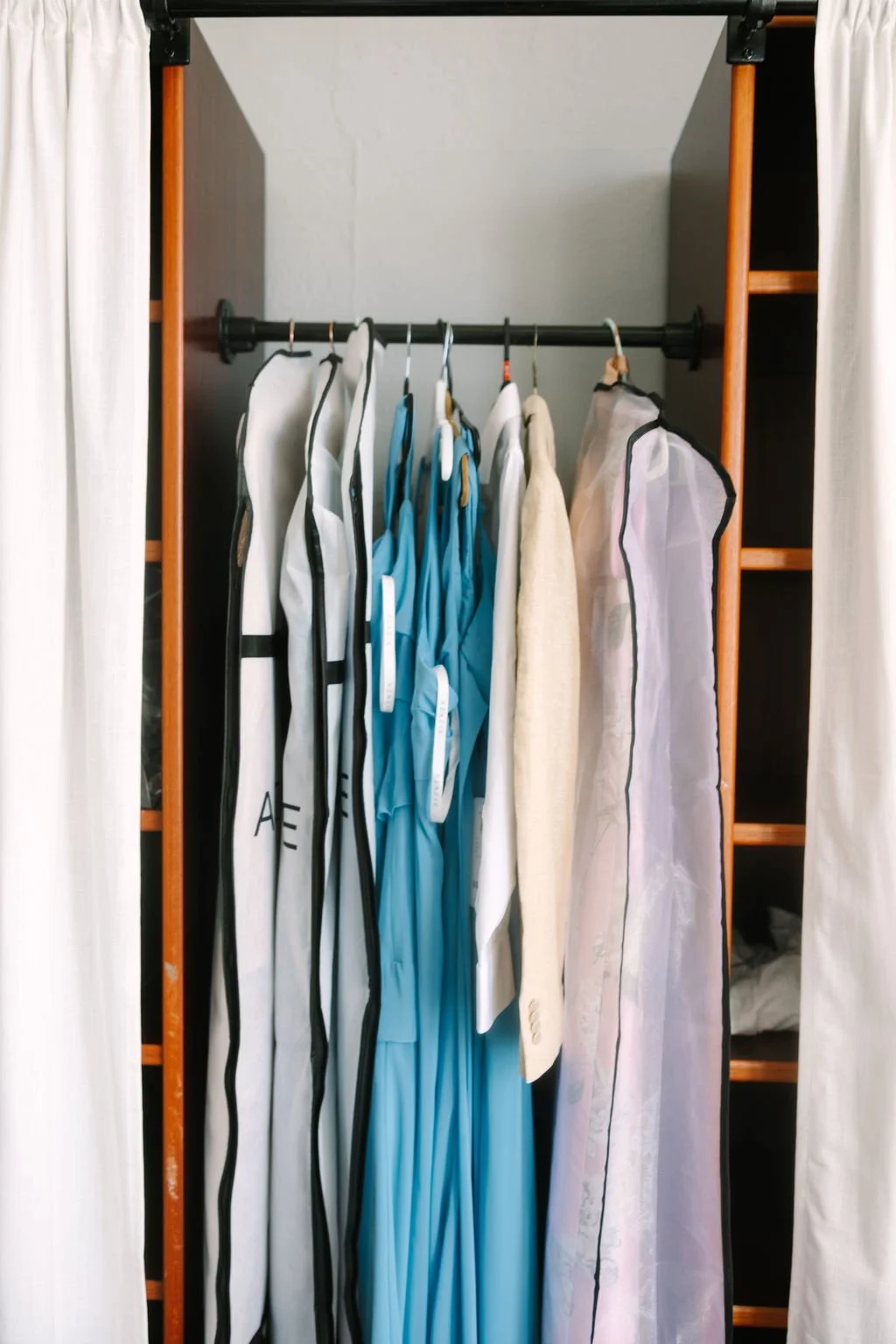 Bridesmaids dresses hanging in the Bridal room.