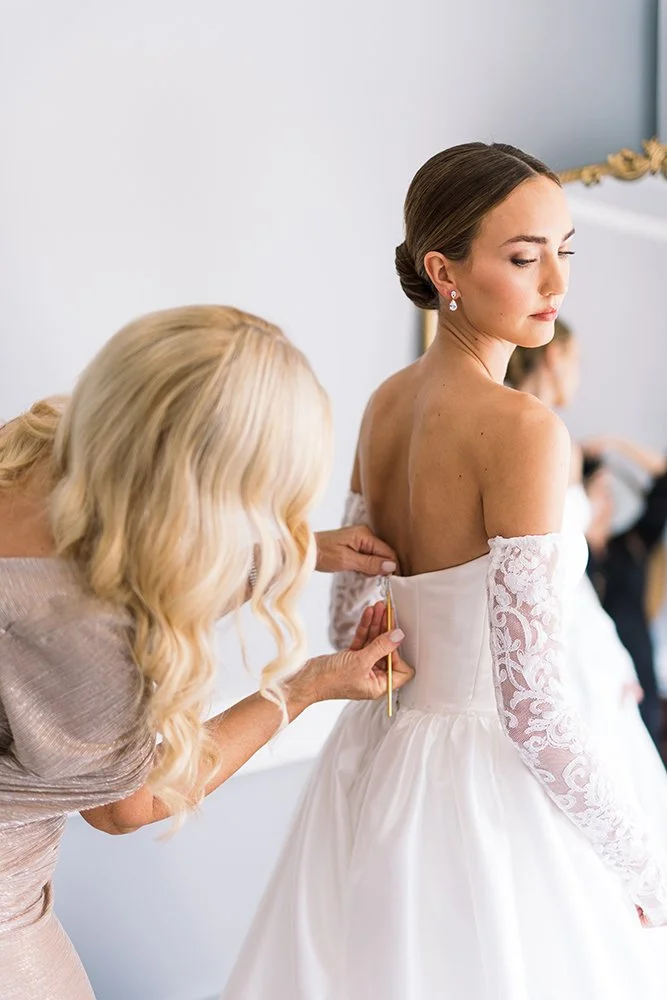 Bride getting ready in Tower Suites bridal getting ready space in St. Augustine, Fl.