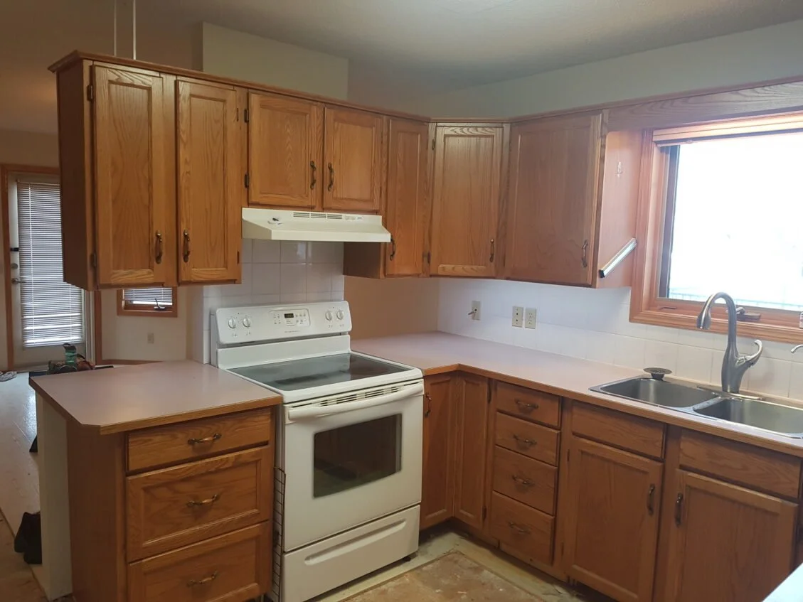 View of kitchen facing dining room - Before