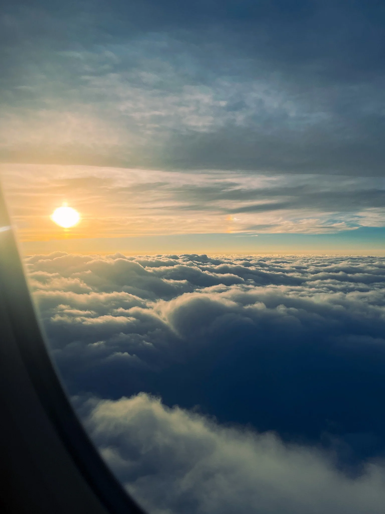 kushphoto-taiwan-airplane-window-clouds-sun-2024.jpg