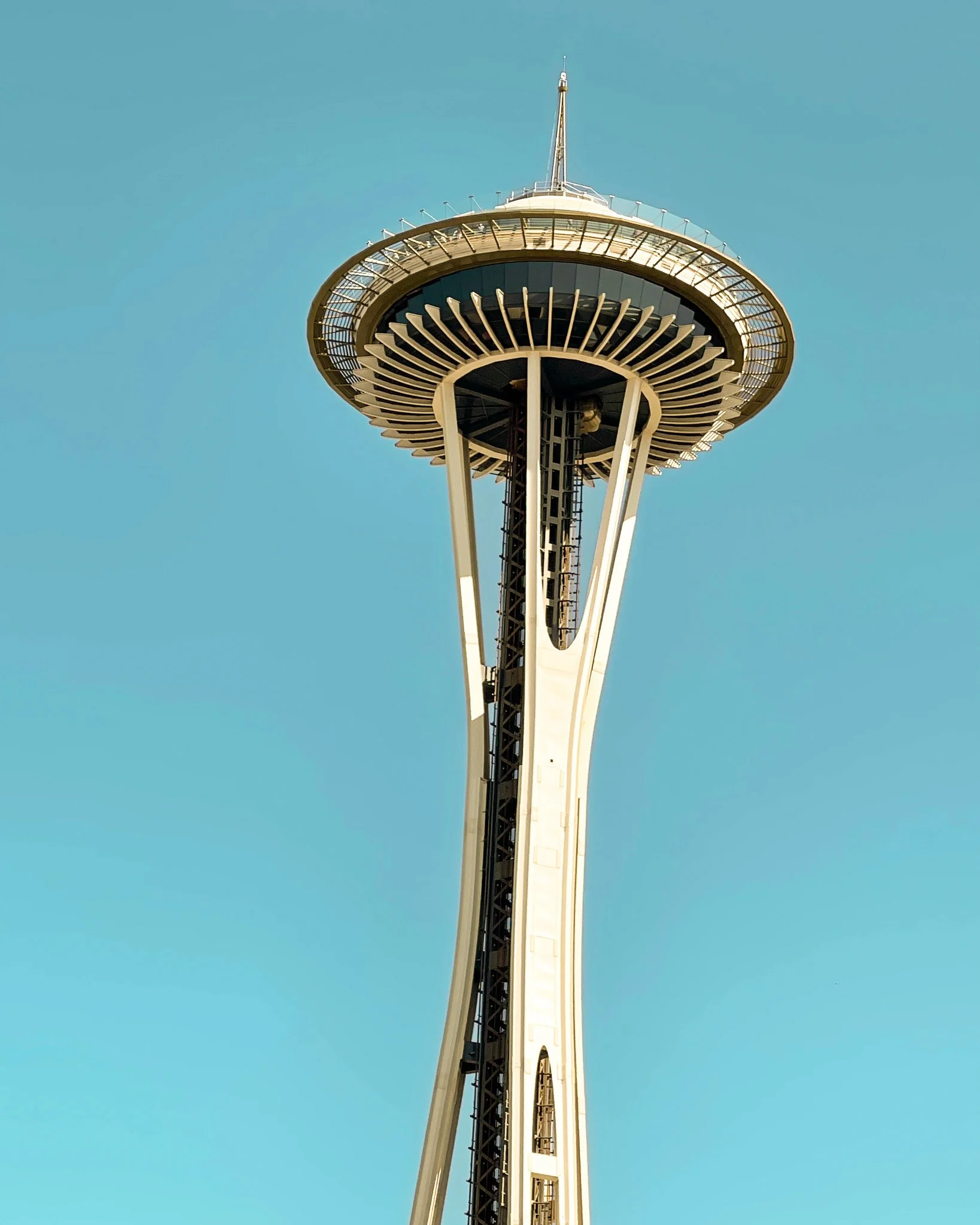Top of the Space Needle against open sky, Seattle, 2021