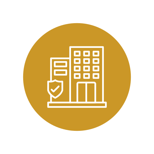 Outline of a building with a shield and checkmark, symbolizing security or insurance, on a gold circular background.
