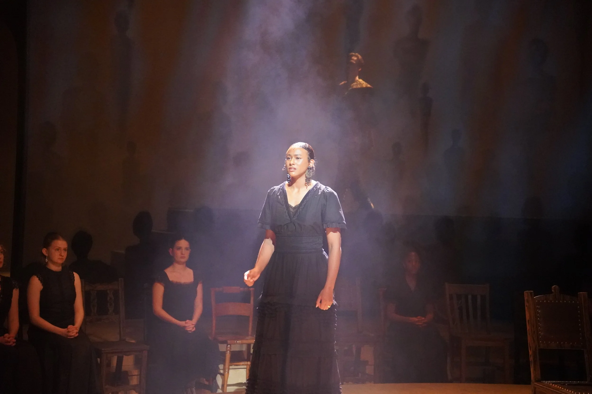 Direction and choreography by William Carlos Angulo; Scenic design by Zeke Leonard; Costume design by Carmen M. Martínez; Lighting design by Henry Killbourn