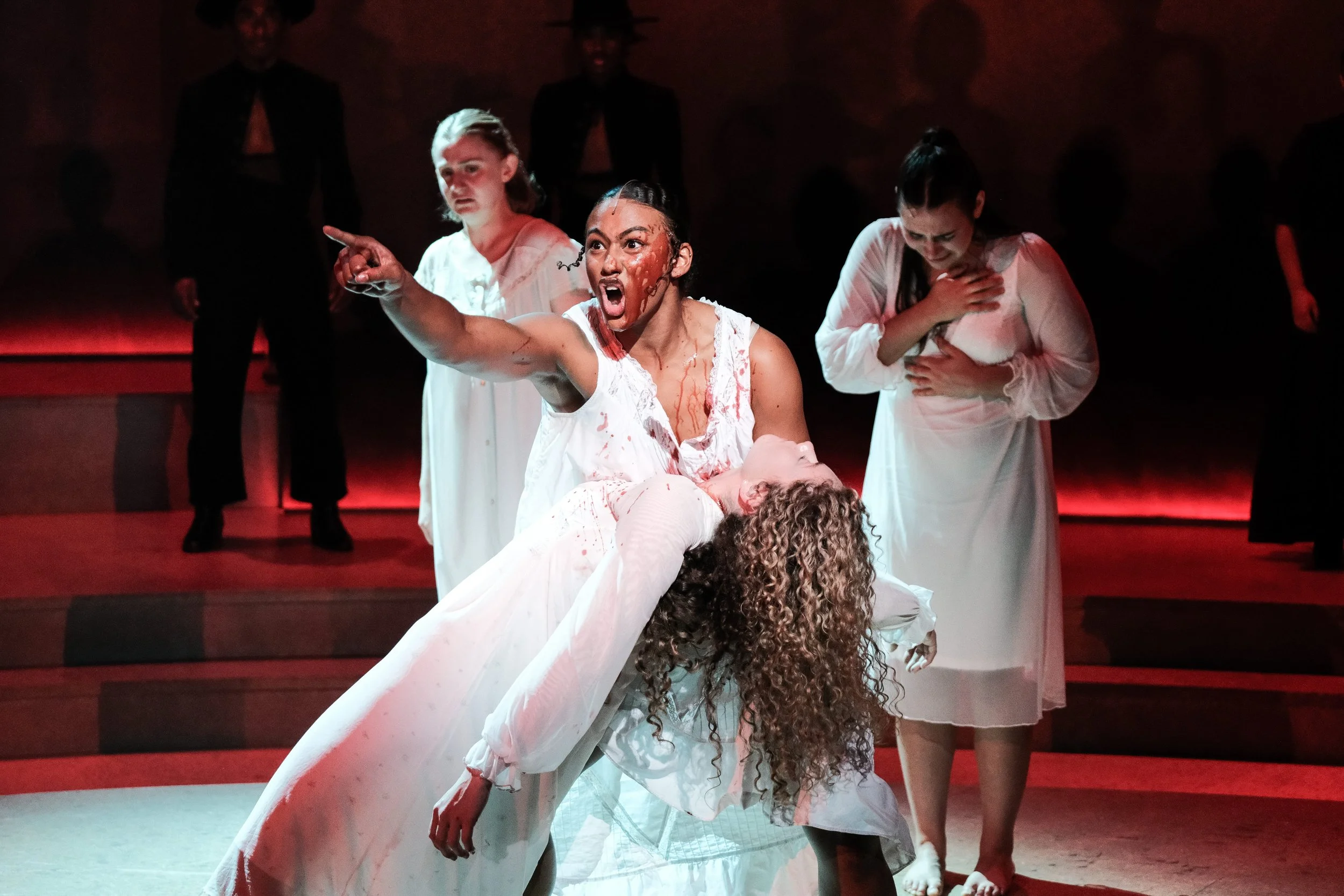 Direction and choreography by William Carlos Angulo; Scenic design by Zeke Leonard; Costume design by Carmen M. Martínez; Lighting design by Henry Killbourn