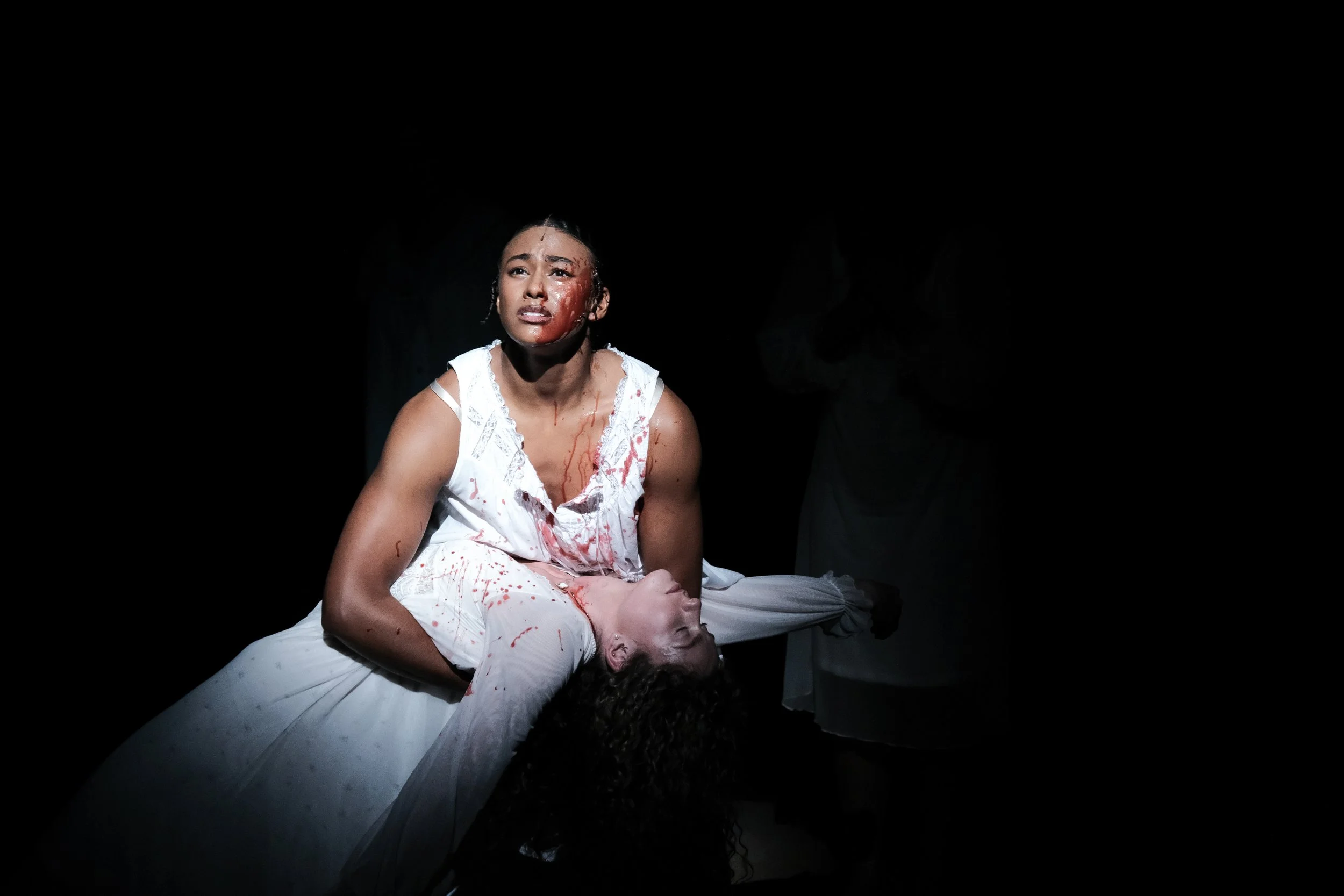Direction and choreography by William Carlos Angulo; Scenic design by Zeke Leonard; Costume design by Carmen M. Martínez; Lighting design by Henry Killbourn