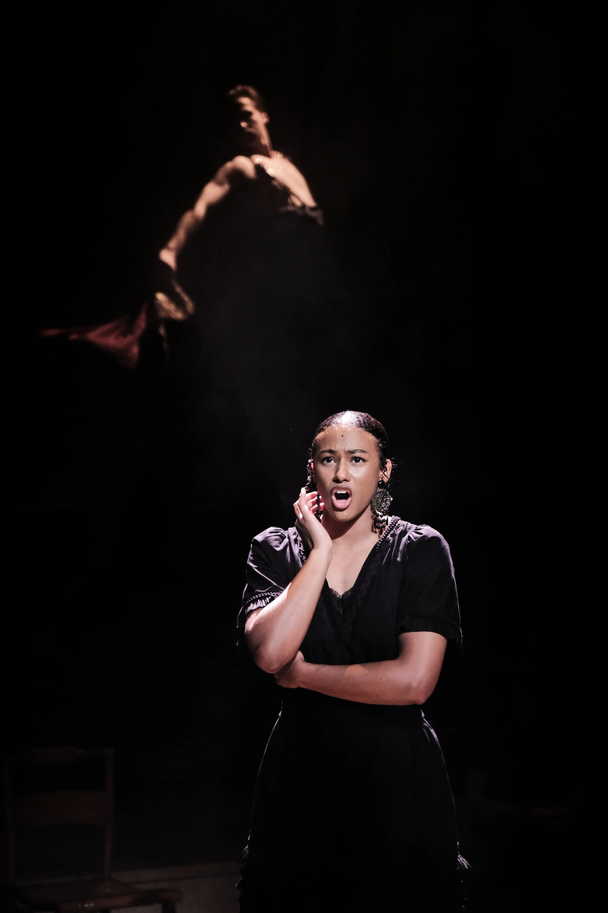 Direction and choreography by William Carlos Angulo; Scenic design by Zeke Leonard; Costume design by Carmen M. Martínez; Lighting design by Henry Killbourn