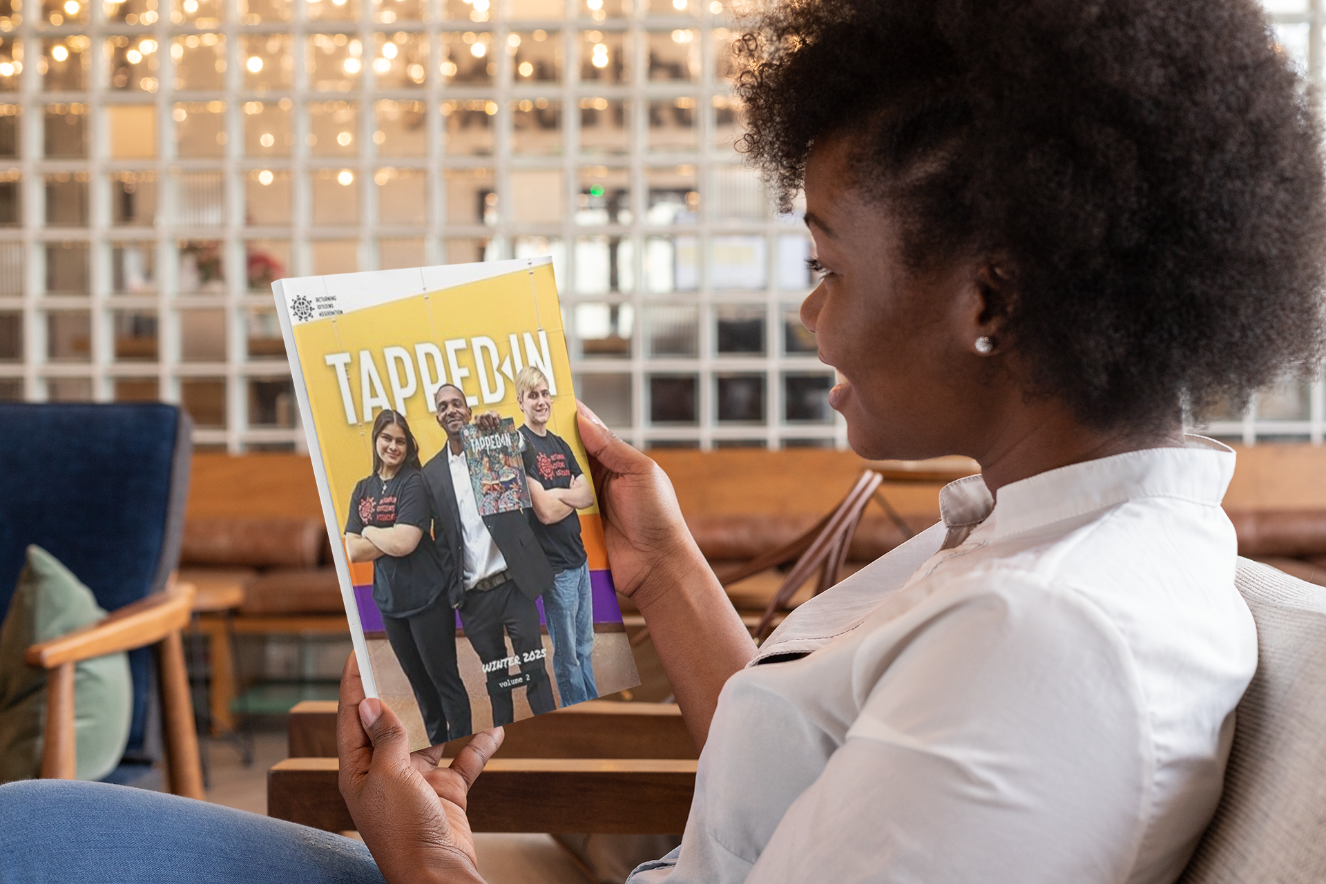 mockup-of-a-young-woman-staring-at-a-magazine-s-cover-31559.png