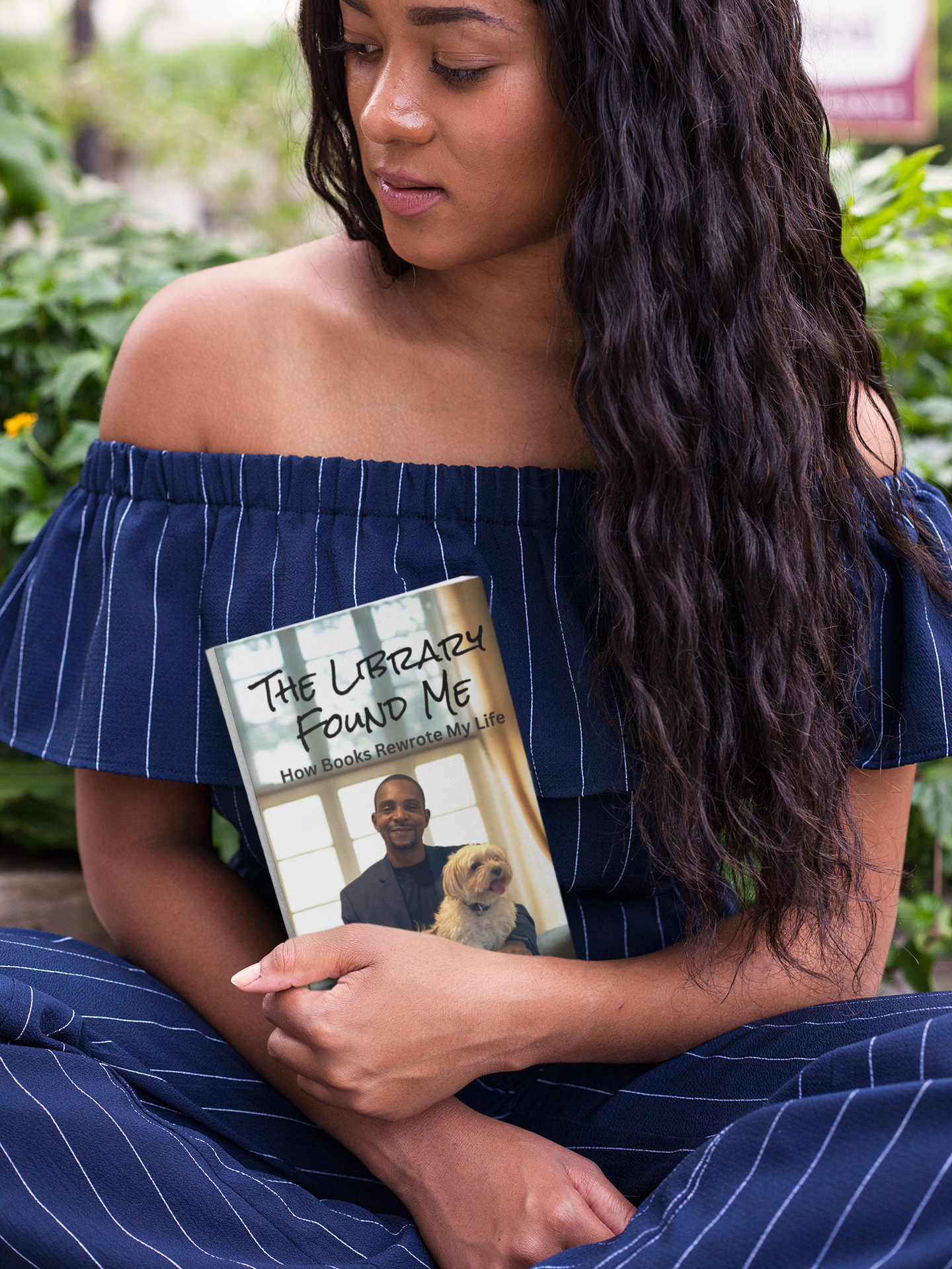 mockup-of-a-woman-holding-a-book-while-at-the-park.png