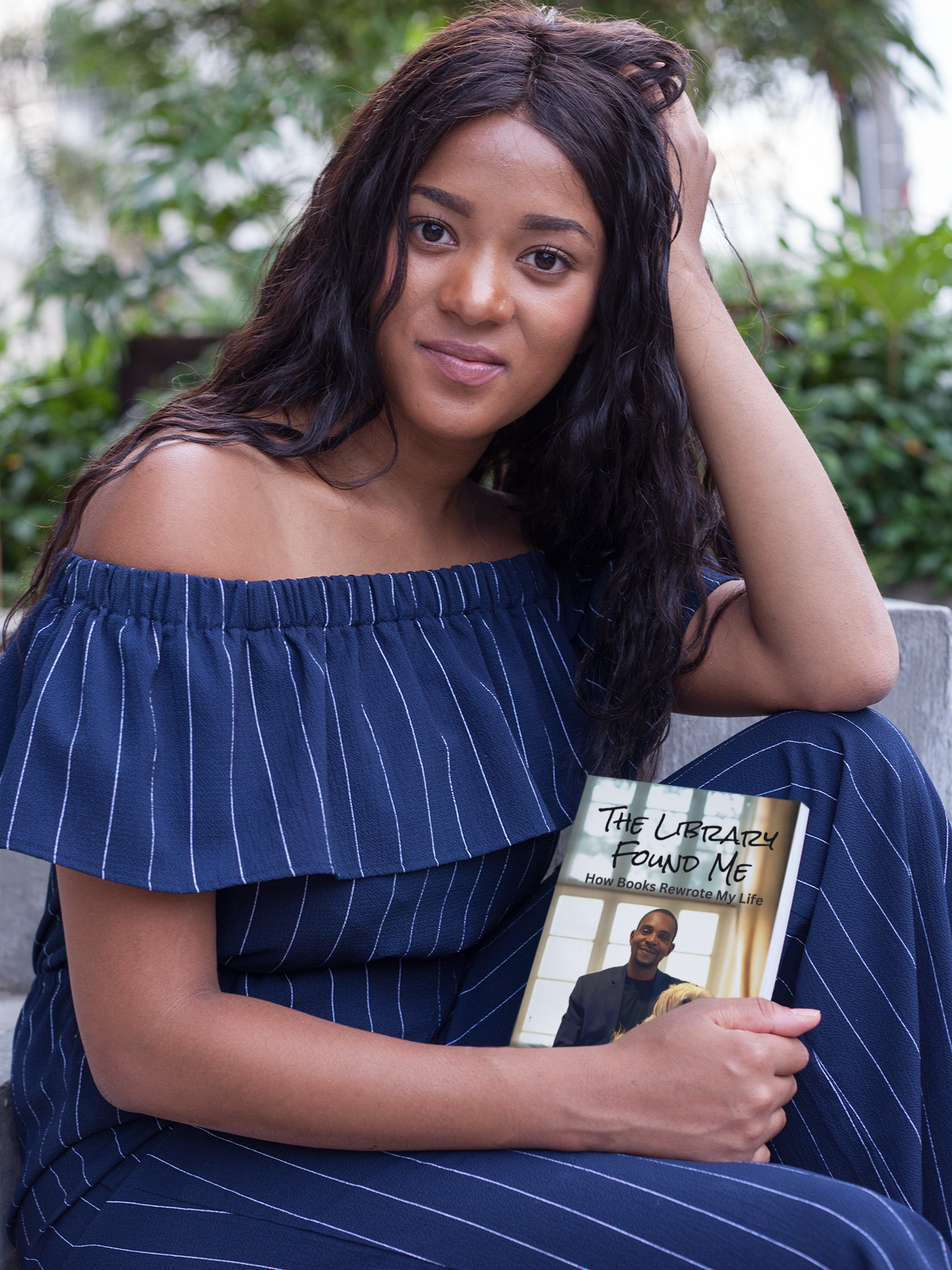portrait-of-a-beautiful-woman-holding-a-book-mockup-while-at-a-park-a17334.png