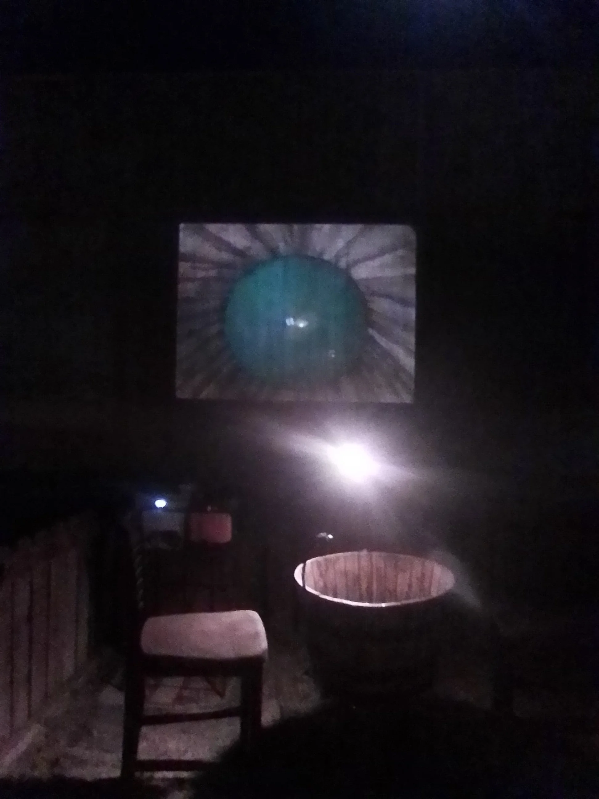dice hole in yard willies projector.jpg