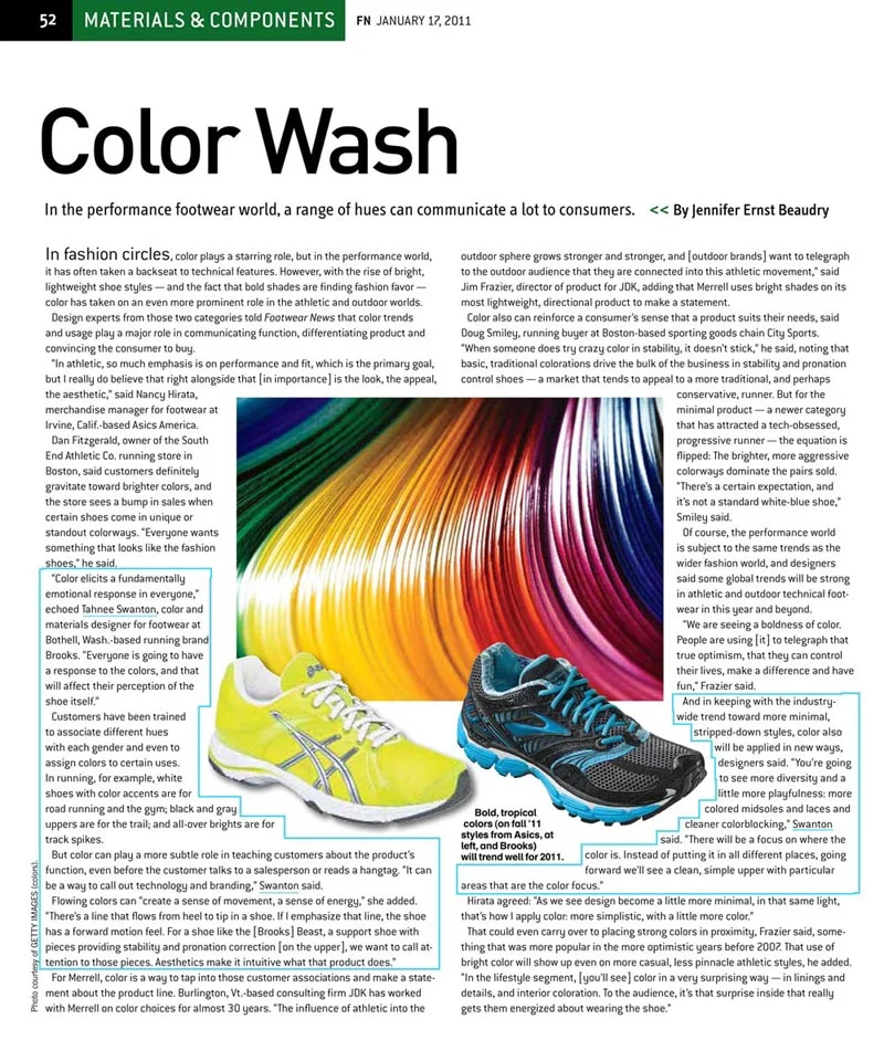 Colorful athletic shoes, one yellow and one black with teal accents.