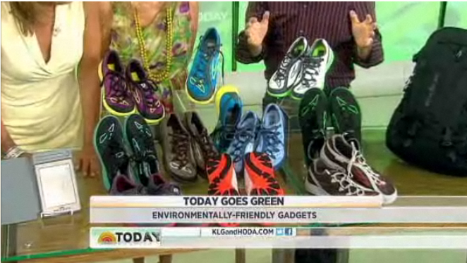 Display of various colorful sneakers suitable for outdoor activities, with a banner on a TV show promoting eco-friendly gadgets.