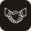 Two hands shaking in a handshake.