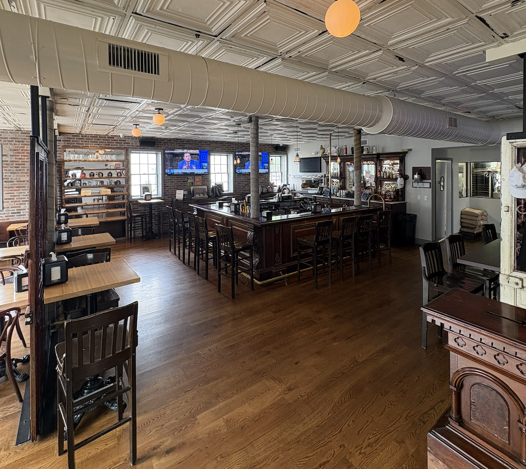 Full Wogies Katonah space with central bar, seating, and open floor for private events