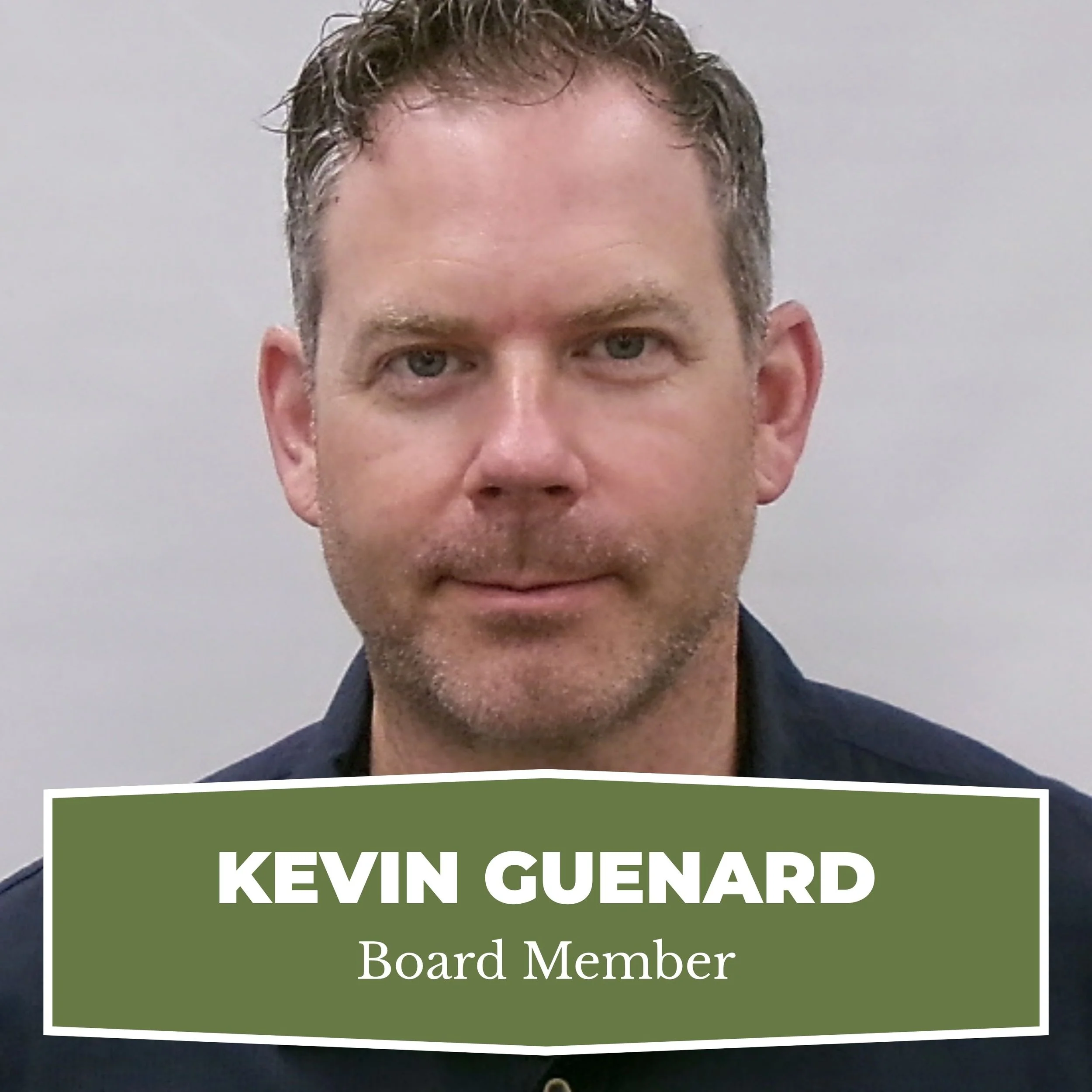 Photograph of Kevin Guenard, a man with short, wavy brown hair and light facial hair, wearing a dark shirt, against a light gray background. The image includes a green banner at the bottom with his name and title, 'Kevin Guenard, Board Member'.