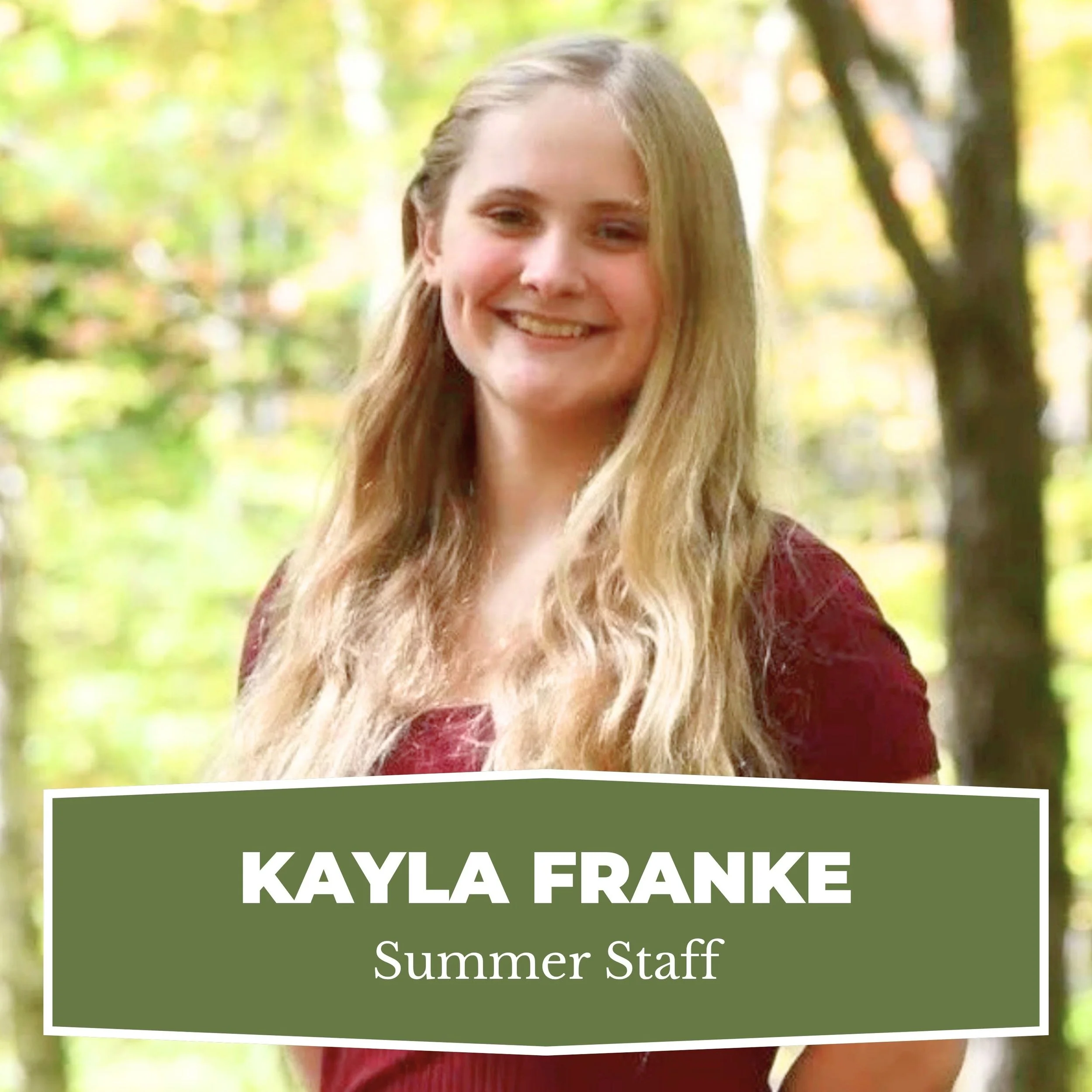 A young woman with long blonde hair smiling outdoors with trees in the background, matching her name badge for Kayla Franke, Summer Staff.