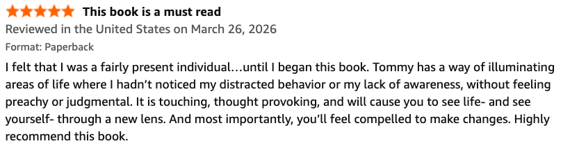 Book review with five stars, titled "This book is a must read," reviewed on March 26, 2026, praising the book's impact and importance.