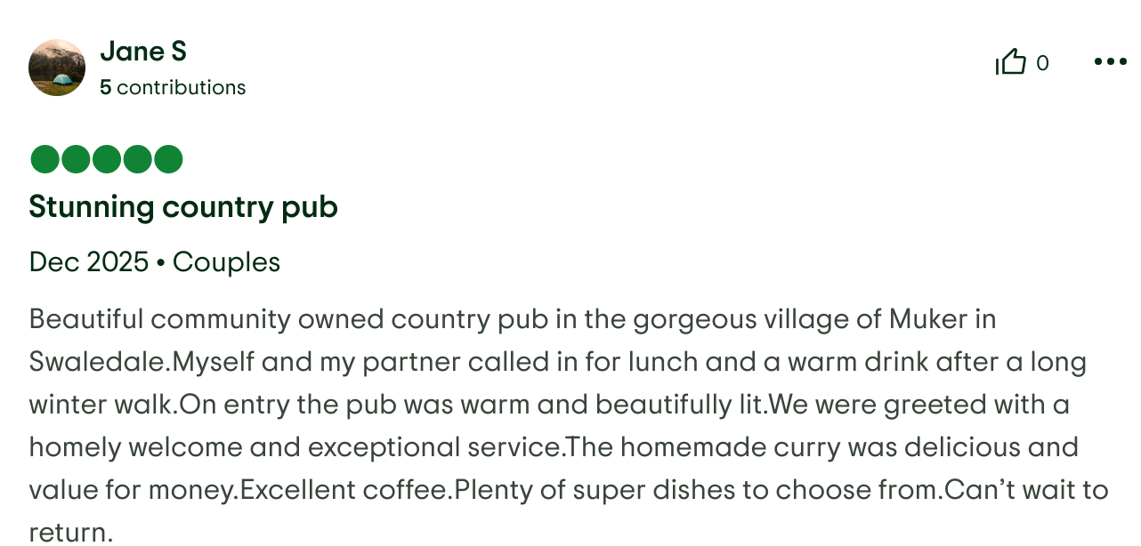 Screenshot of a travel review for a country pub in Swaledale, describing a visit with details about the atmosphere, food, and drinks.