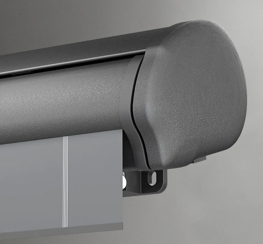 Close-up of a dark gray roof rack end cap mounted on a vehicle crossbar.