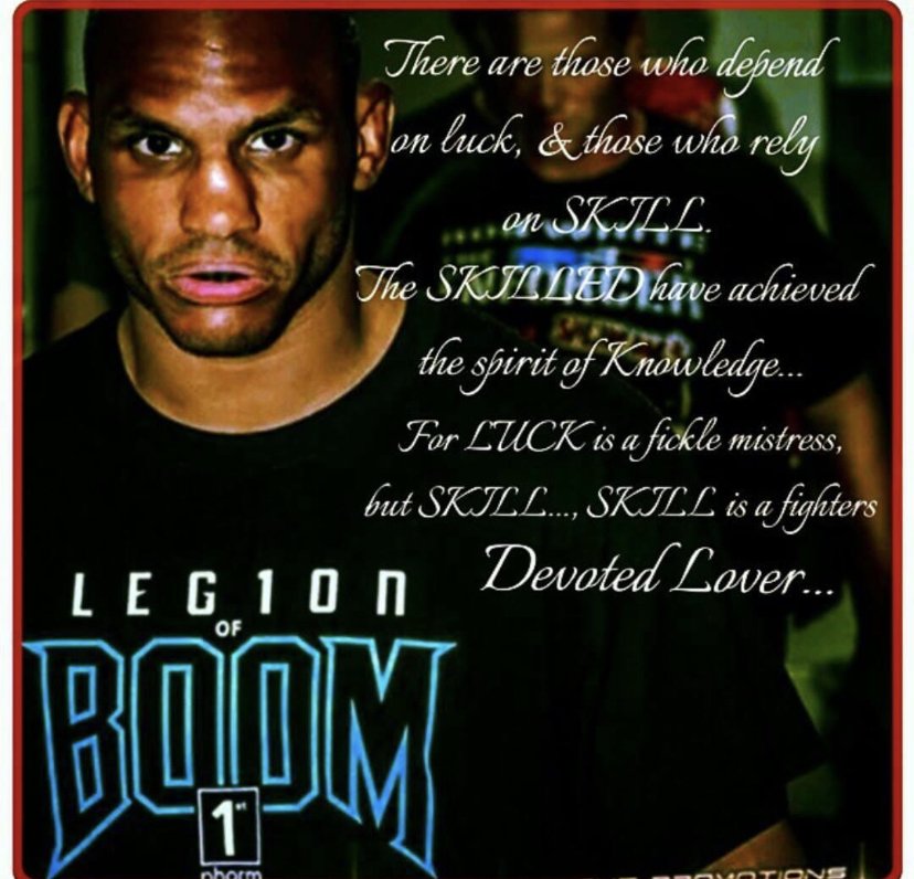 A man with a serious expression in a dark background, overlaid with a quote about luck and skill, and the title "Legend of Boom" in bold, blue letters.