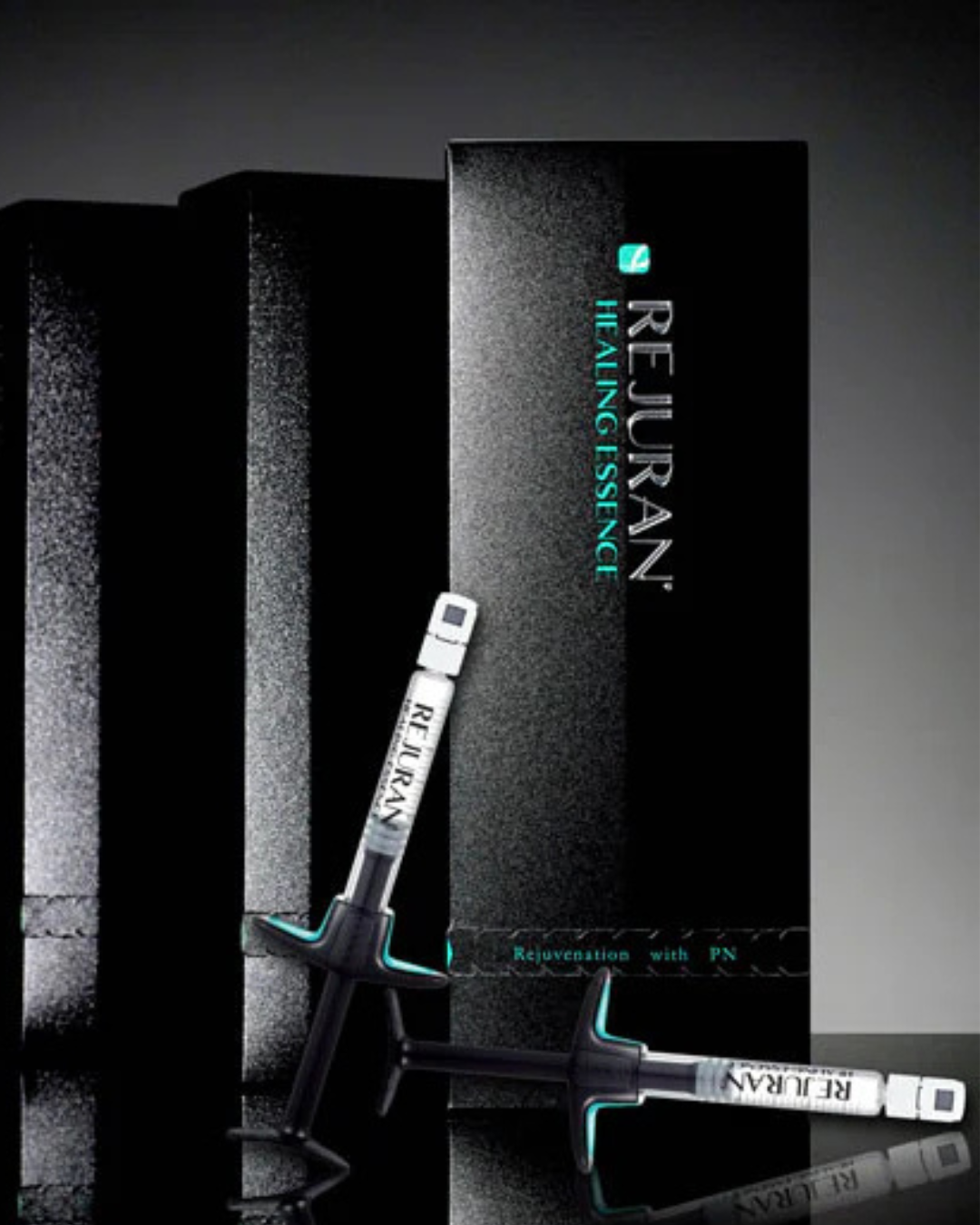 Rejuran box and prefilled syringe displayed on a table.