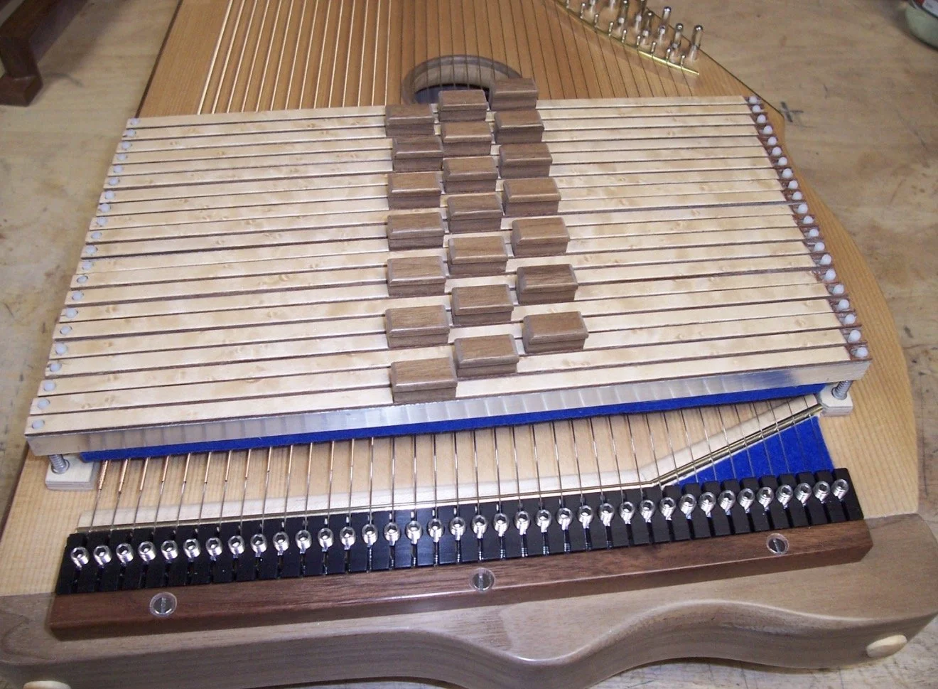 Chordbars complete with Walnut buttons, light springs and felts glued on prior to cutting