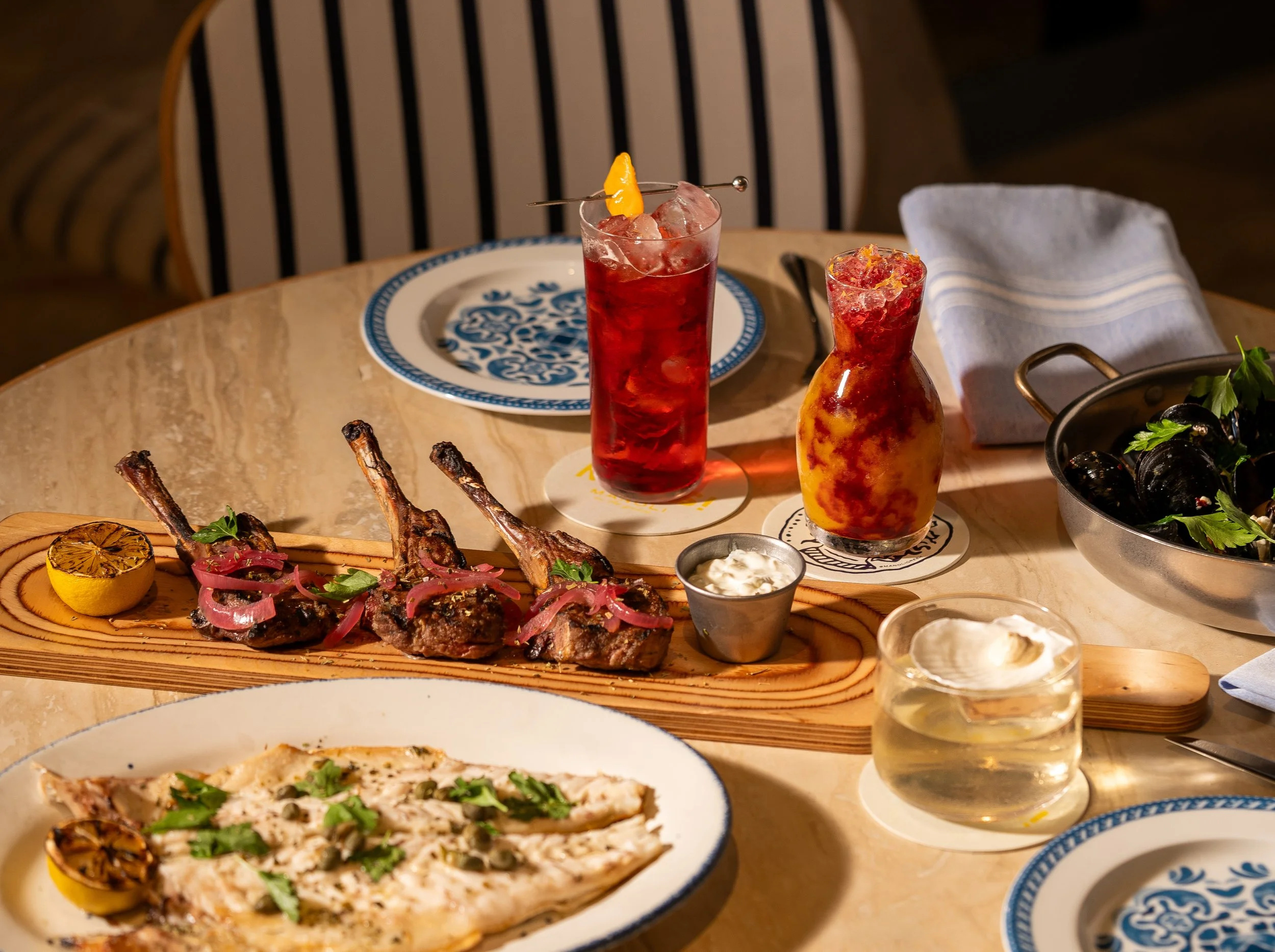 Cocktails and food from Manoli in the Grove