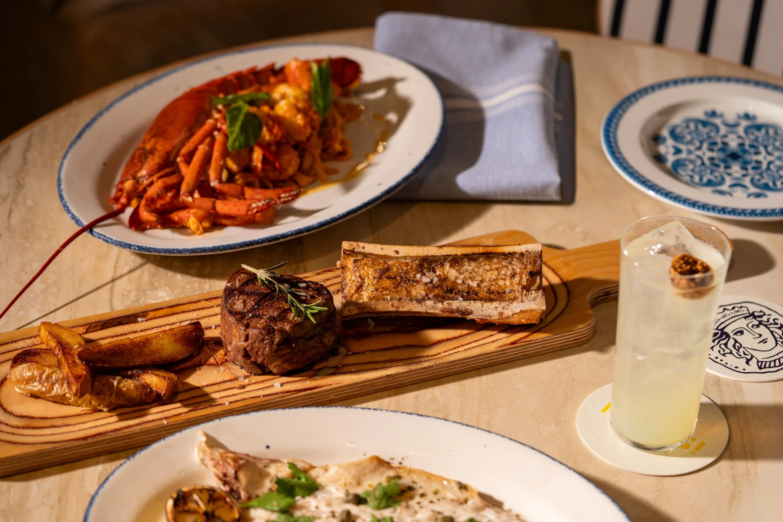 Cocktails and food from Manoli in the Grove