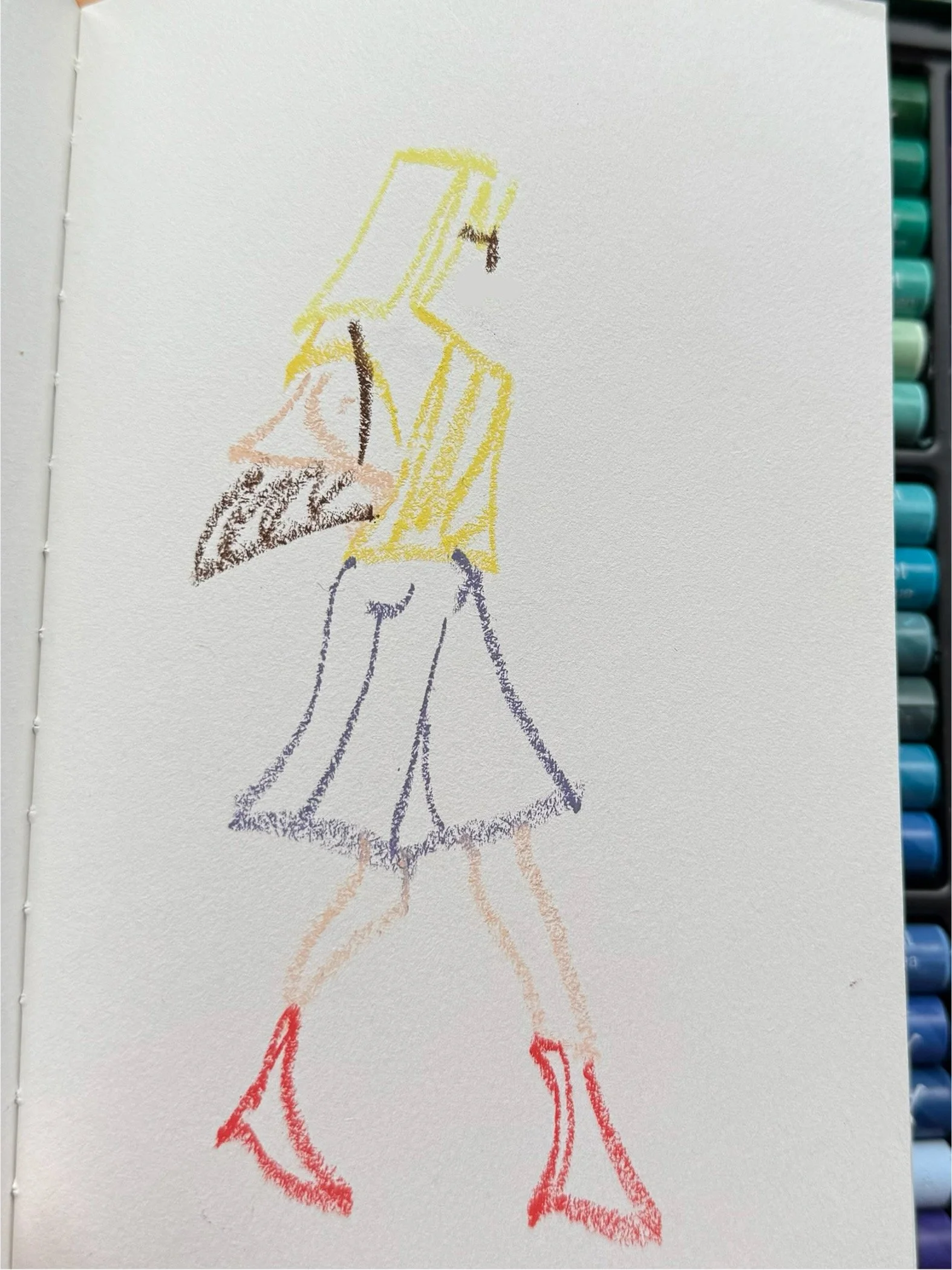 A simple crayon drawing of a woman, standing and facing sideways, with red high-heeled shoes, a purple skirt, a yellow top, and brown hair.