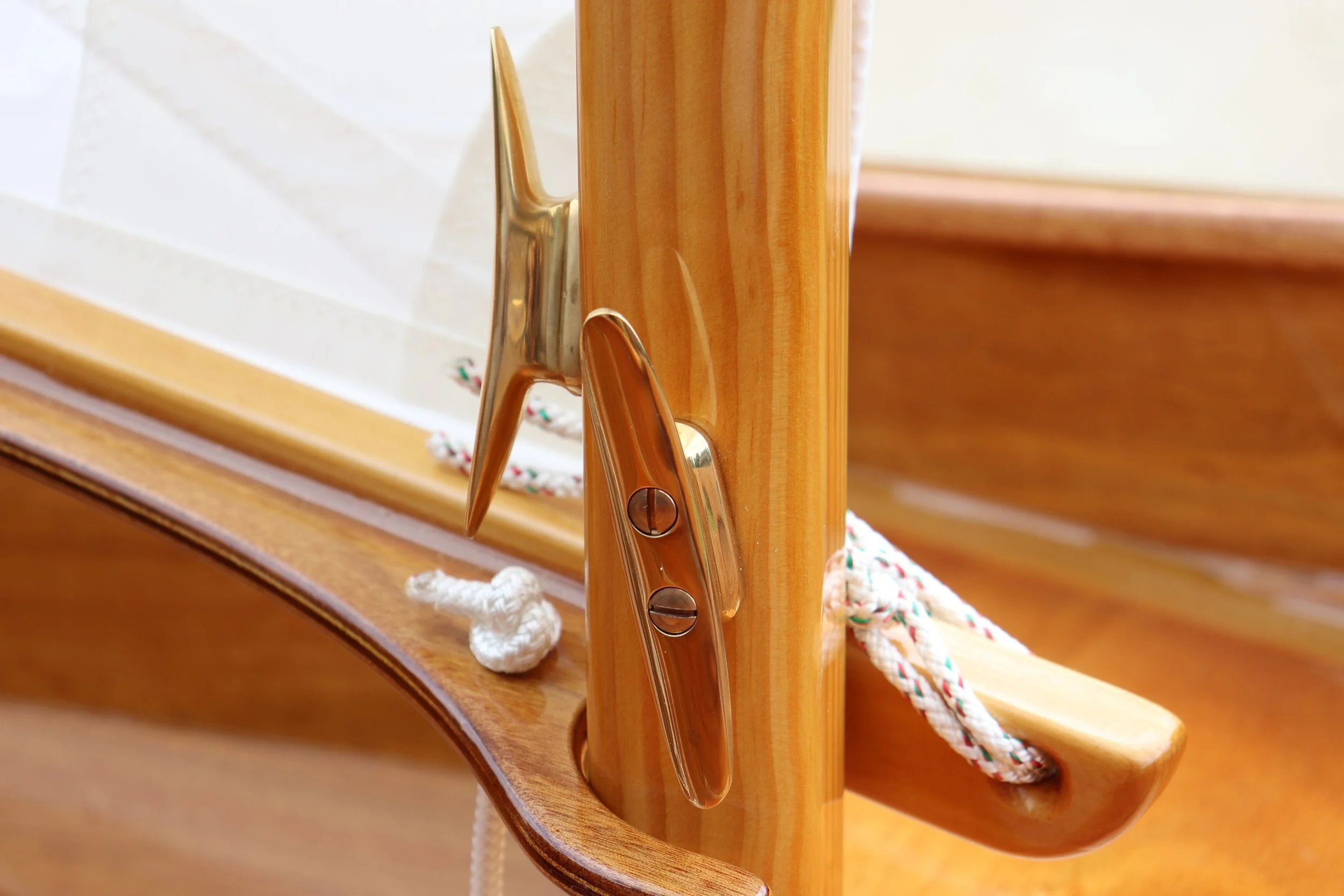 Crafted Calm

Close-up of varnished wood and polished hardware reveals the quiet artistry behind traditional sailcraft. Rope, grain, and metal converge in a moment of tactile calm.

Best Hospitality Use:

Boutique hotel corridors
Spa transition space